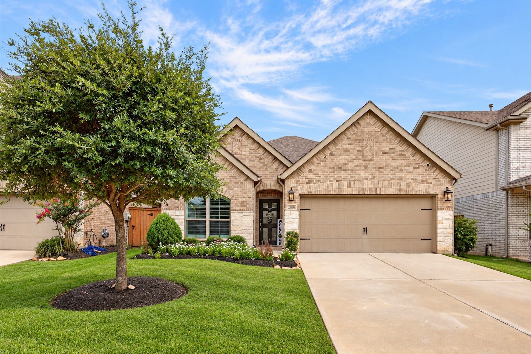23026 Needlegrass Road, Katy, TX 77493 Beautifully maintained Perry Home in Elyson with exceptional curb appeal.