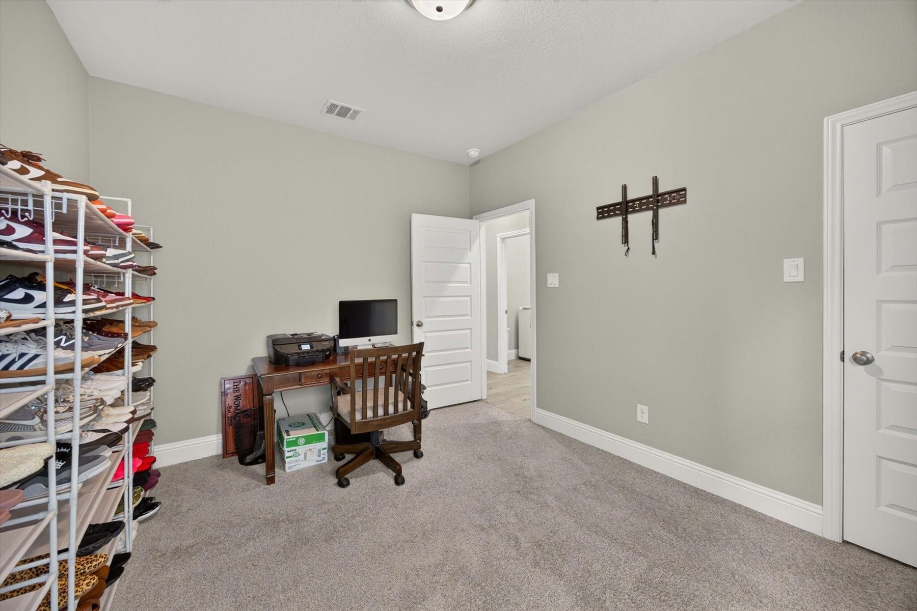 23026 Needlegrass Road, Katy, TX 77493 Bright secondary bedroom with flexible living options.