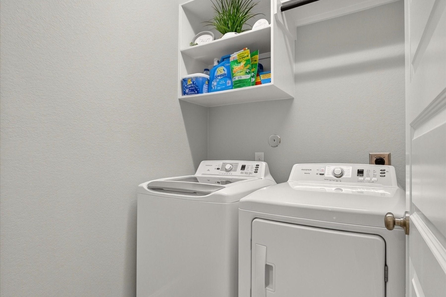 23026 Needlegrass Road, Katy, TX 77493 Convenient laundry room with built-in shelving.