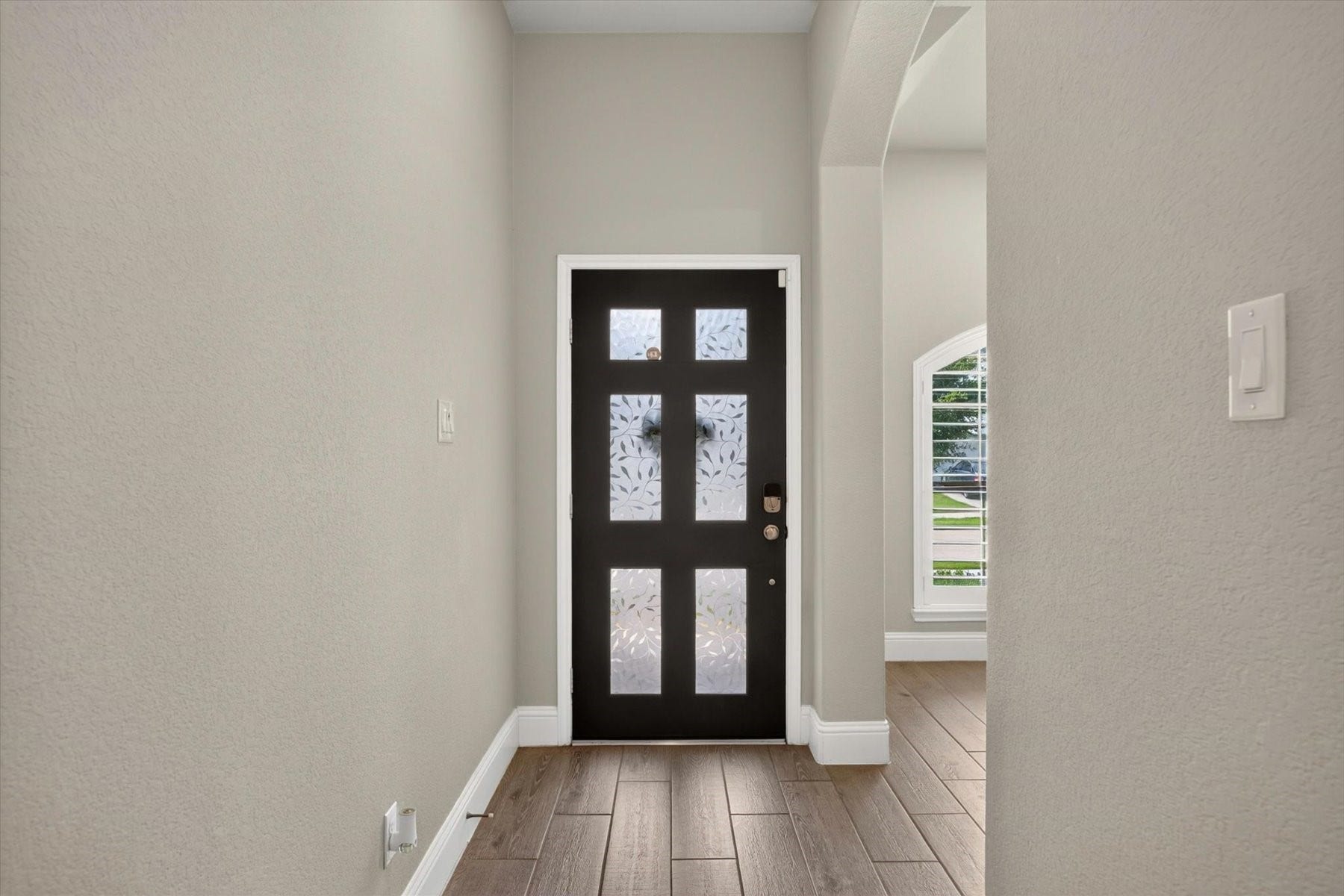 23026 Needlegrass Road, Katy, TX 77493 Elegant foyer with soaring ceilings and abundant natural light.