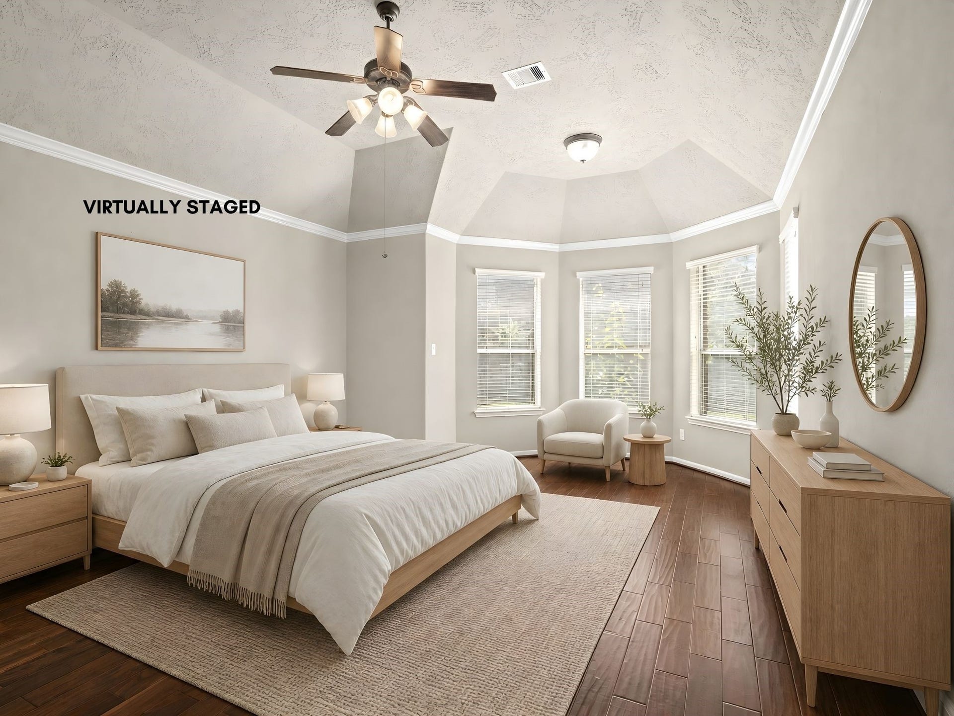 5307 Amber Sky Lane, Rosharon, TX 77583 Retreat to the expansive primary suite, where rich wood flooring, soaring ceilings, a ceiling fan, and elegant double doors create a serene private sanctuary.