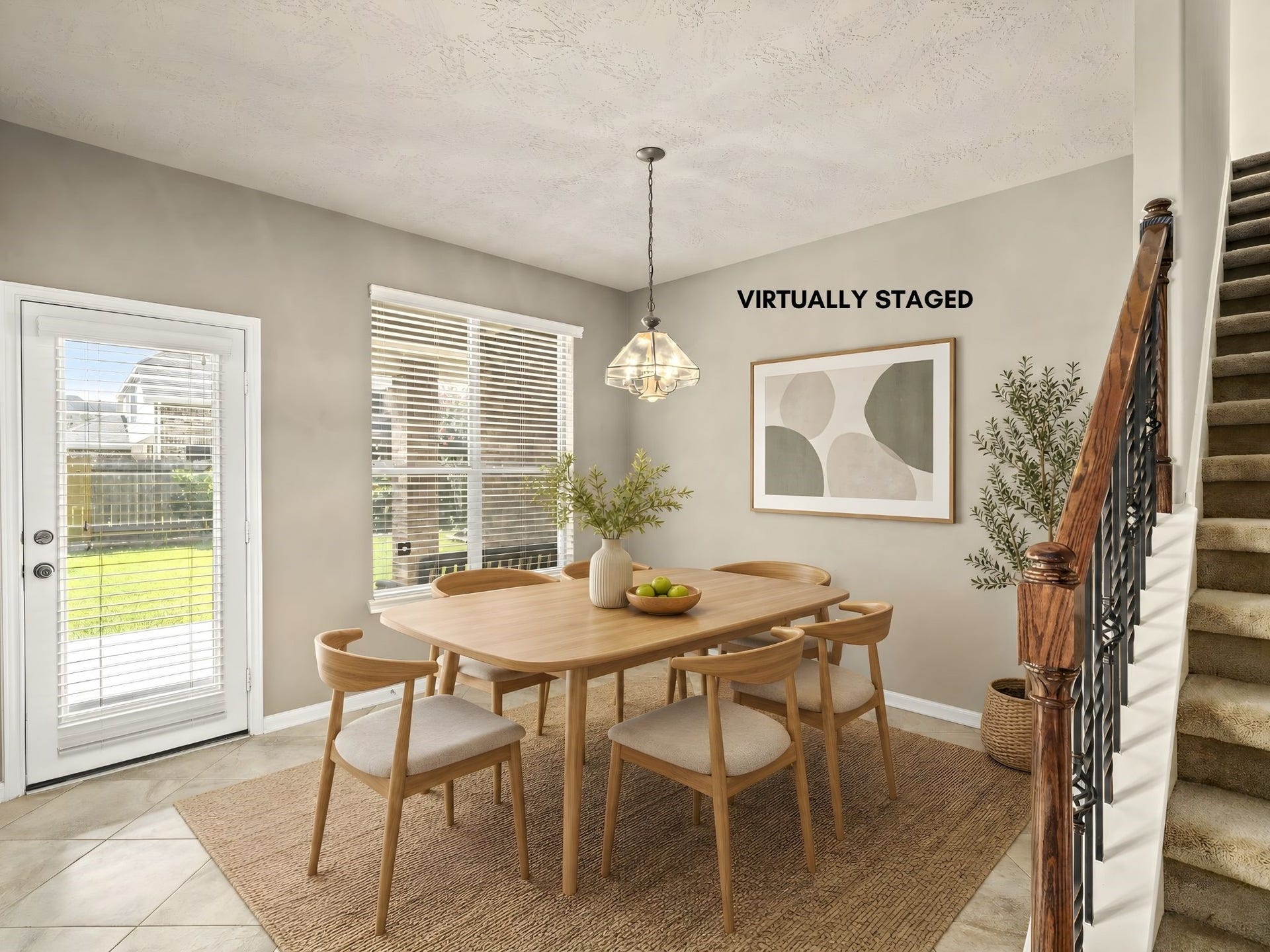 5307 Amber Sky Lane, Rosharon, TX 77583 A picturesque breakfast room with rich tile flooring, framed by oversized windows that flood the space with natural light. Virtually staged for effortless morning elegance.