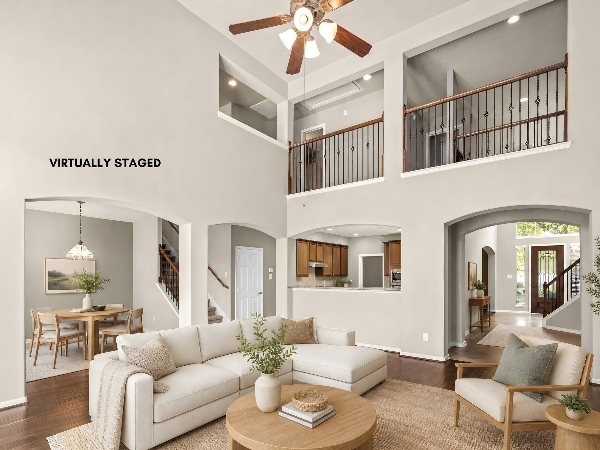 5307 Amber Sky Lane, Rosharon, TX 77583 Granite countertops and warm wood cabinetry flow effortlessly into the adjoining living space through a graceful arched pass-through, an open, light-filled design built for connection.