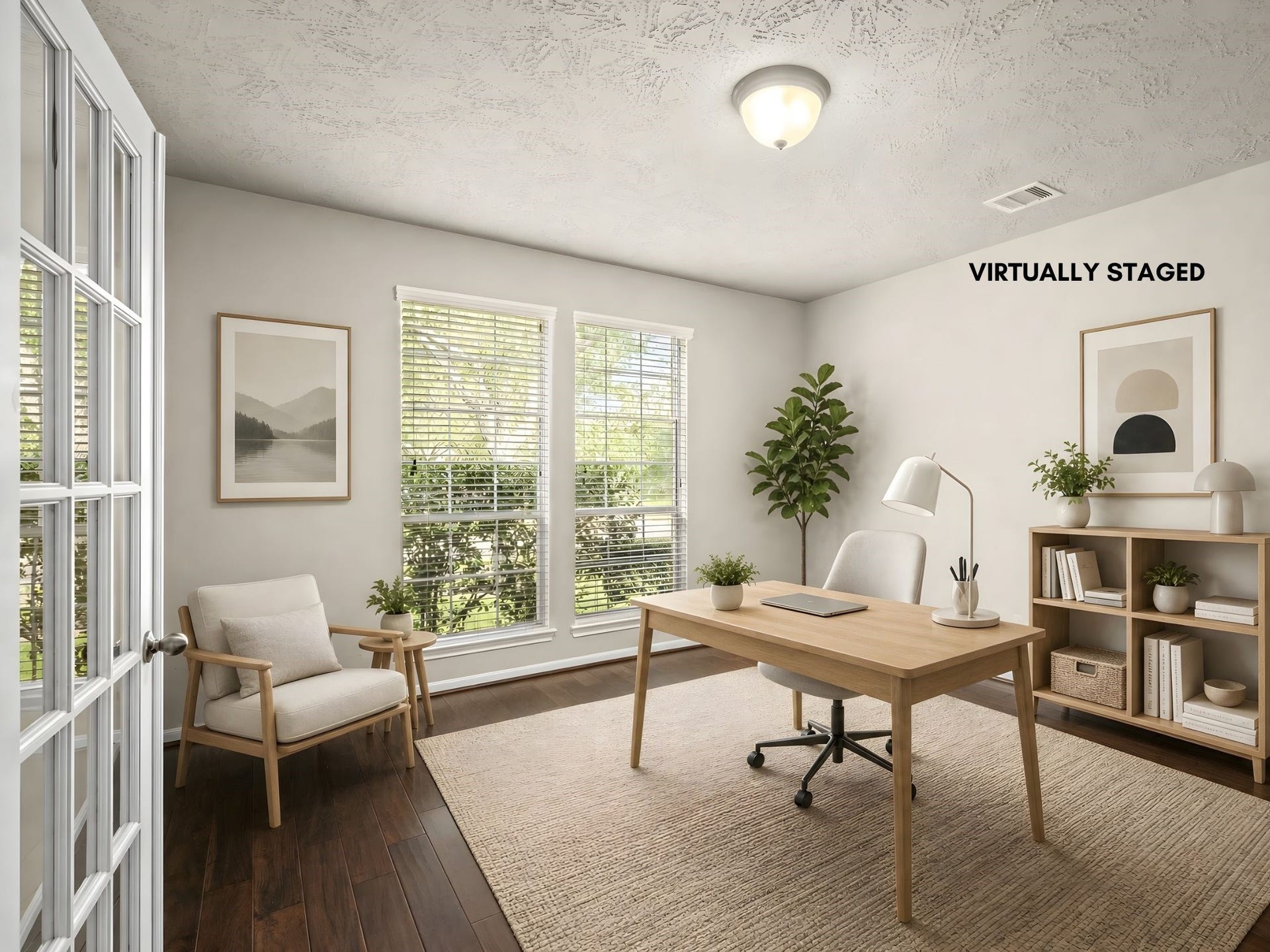 5307 Amber Sky Lane, Rosharon, TX 77583 A sophisticated home office featuring rich engineered wood flooring and elegant double glass-paned doors, virtually styled to showcase the perfect work-from-home retreat bathed in natural light.
