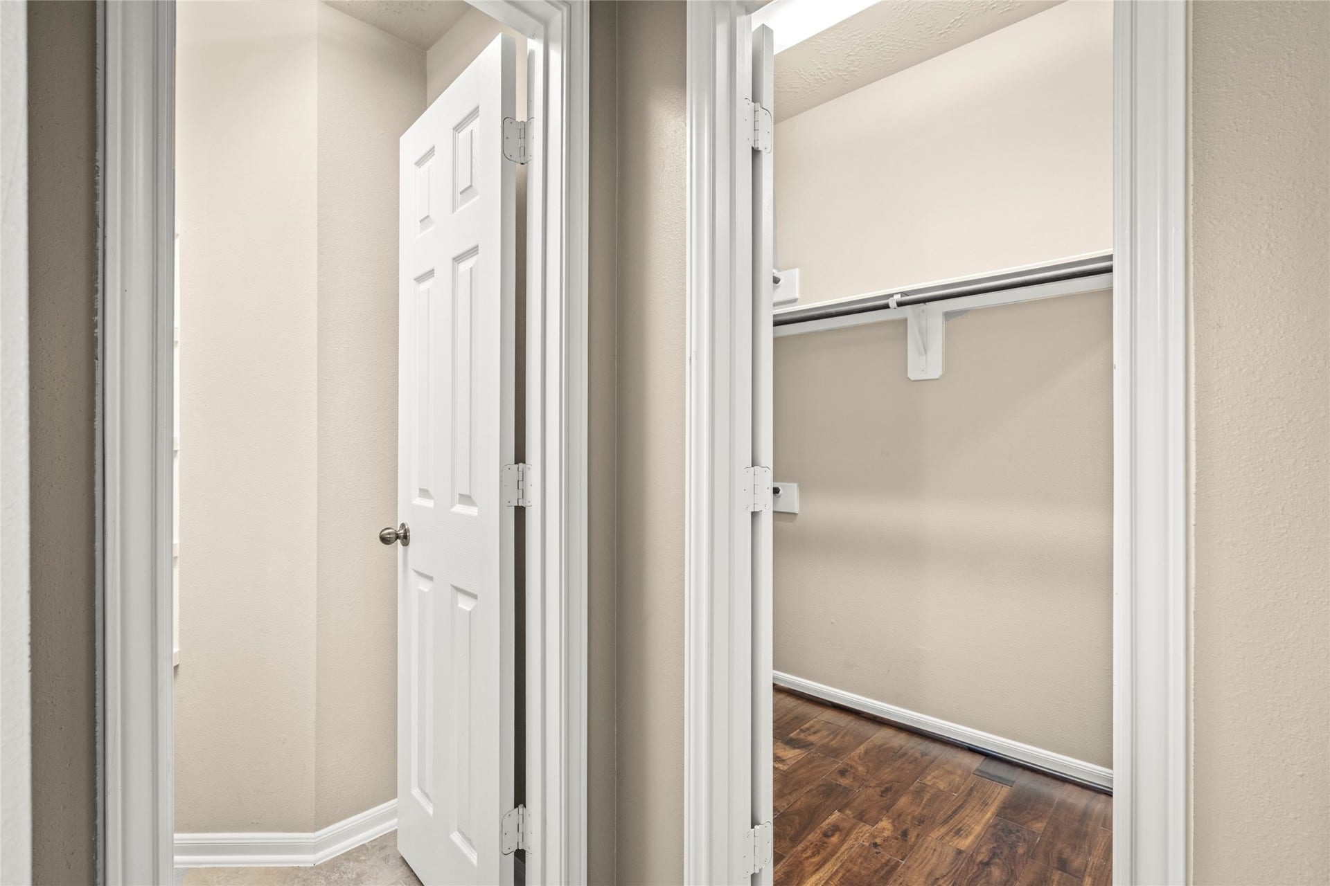 5307 Amber Sky Lane, Rosharon, TX 77583 This photo shows the entrance to the walk-in closet and ensuite bath of the primary bedroom.