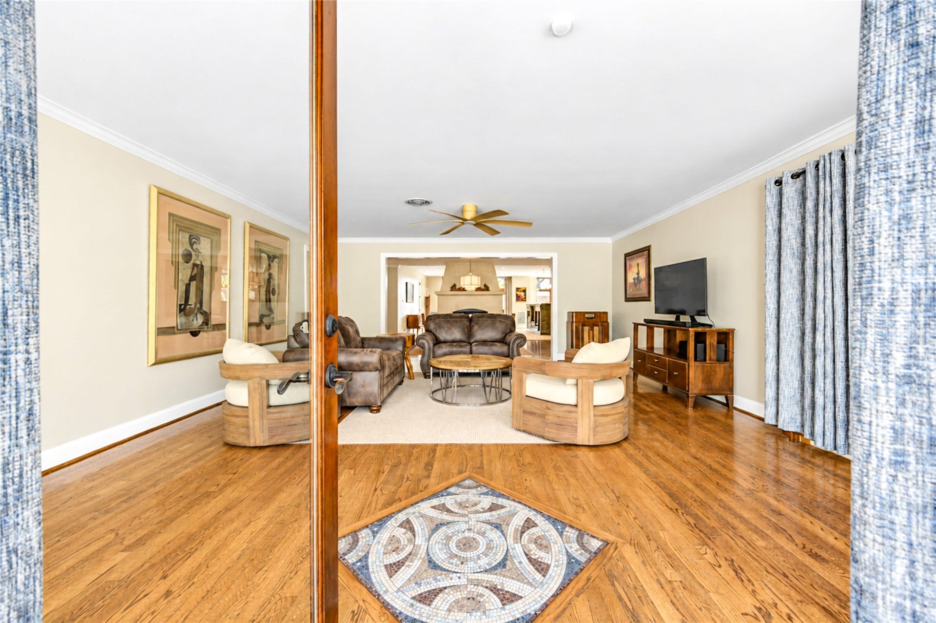 6211 Grovewood Lane, Houston, TX 77008 This is the living-room photograph with the decorative floor inlay we discussed.