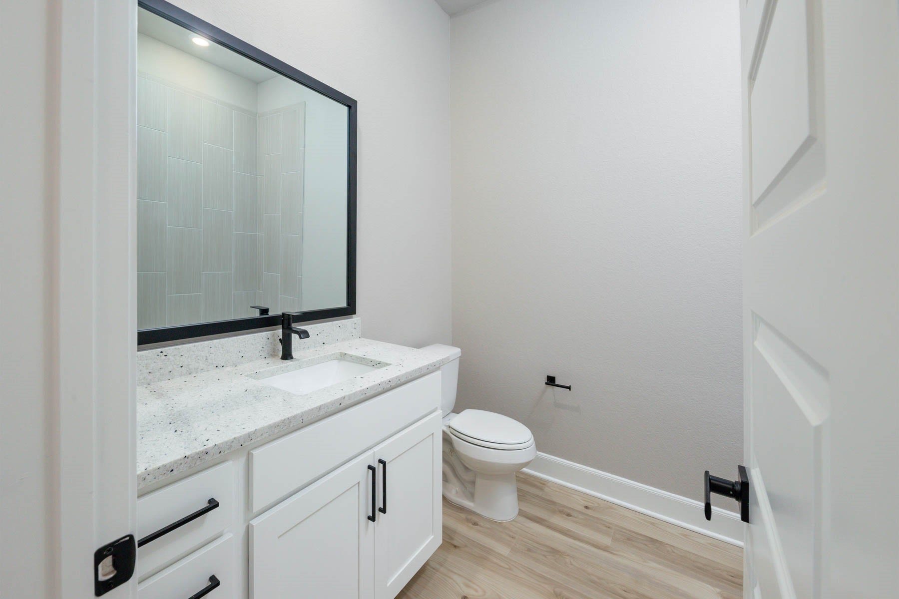 10506 Sutter Creek Drive, Iowa Colony, TX 77583 Each bathroom has expansive vanities offering an abundance of storage below.