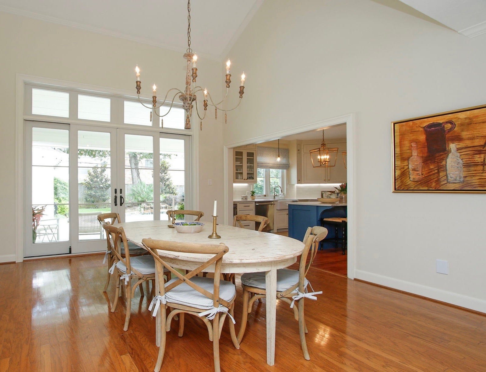 8515 Tranquil Park Drive, Spring, TX 77379 This elegant dining room boasts a stunning glass wall with double doors opening to the pool and patio.