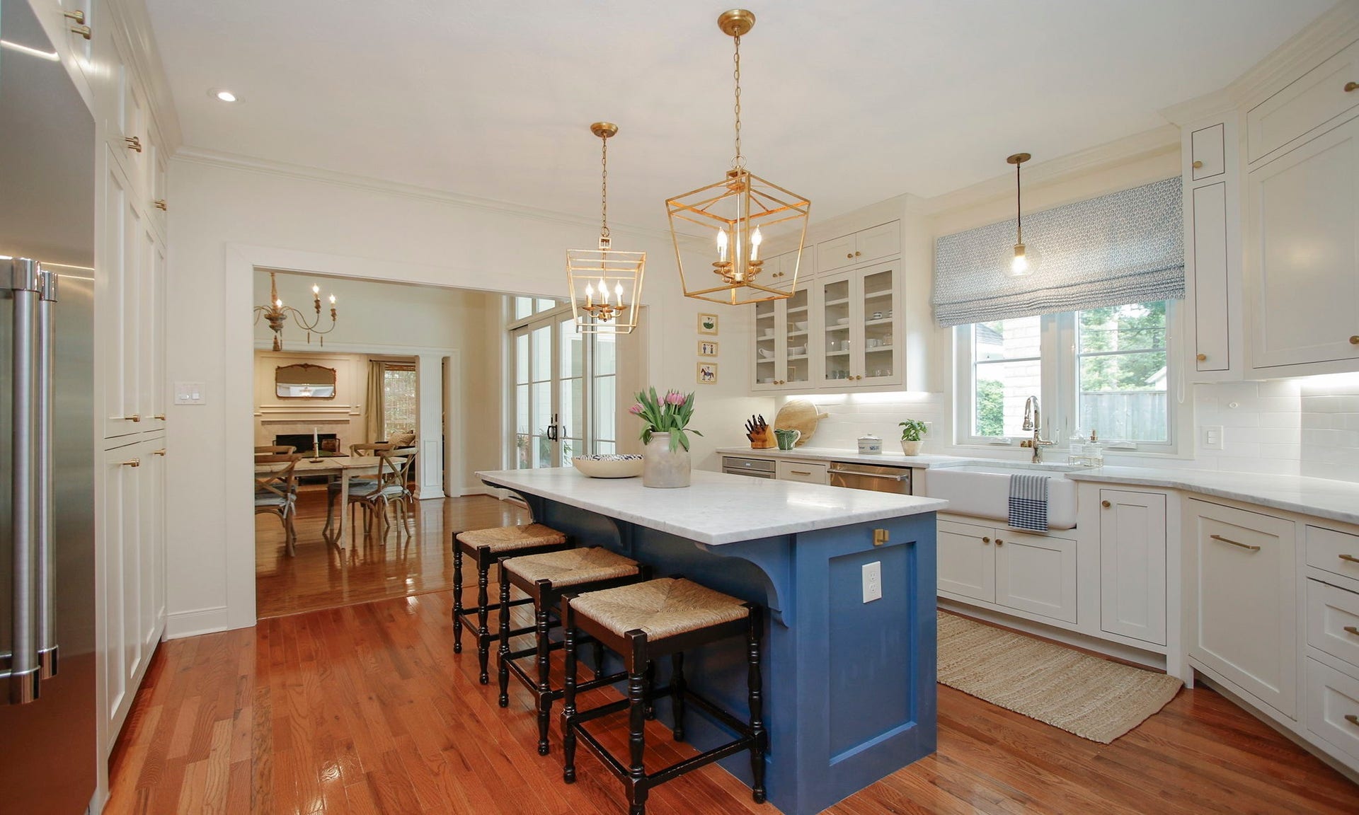 8515 Tranquil Park Drive, Spring, TX 77379 A large Carrara marble topped island offers plenty of storage in addition to a wall of cabinetry not shown.