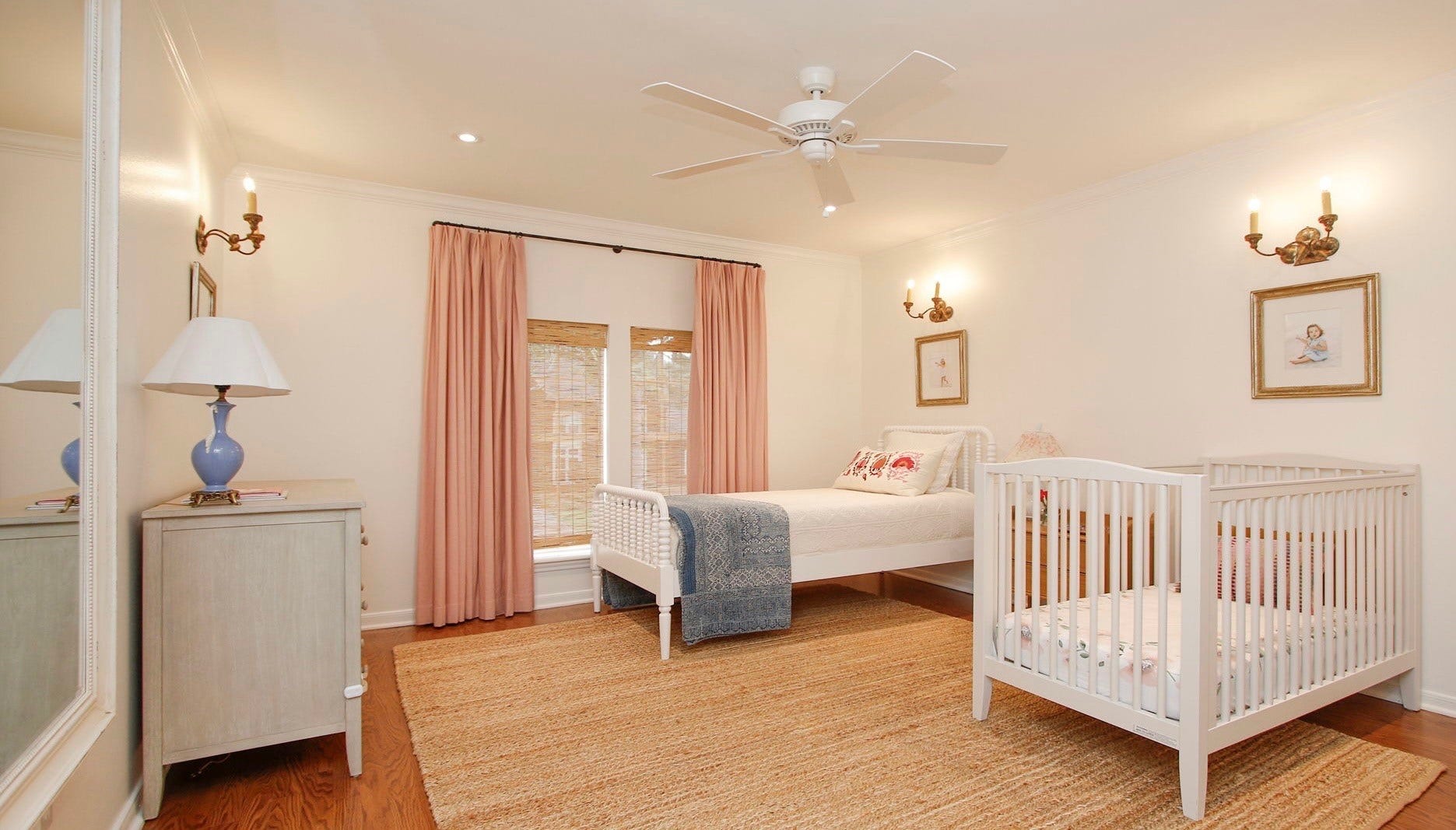 8515 Tranquil Park Drive, Spring, TX 77379 Charming bedroom on the second floor with engineered hardwood floors and ceiling fan.