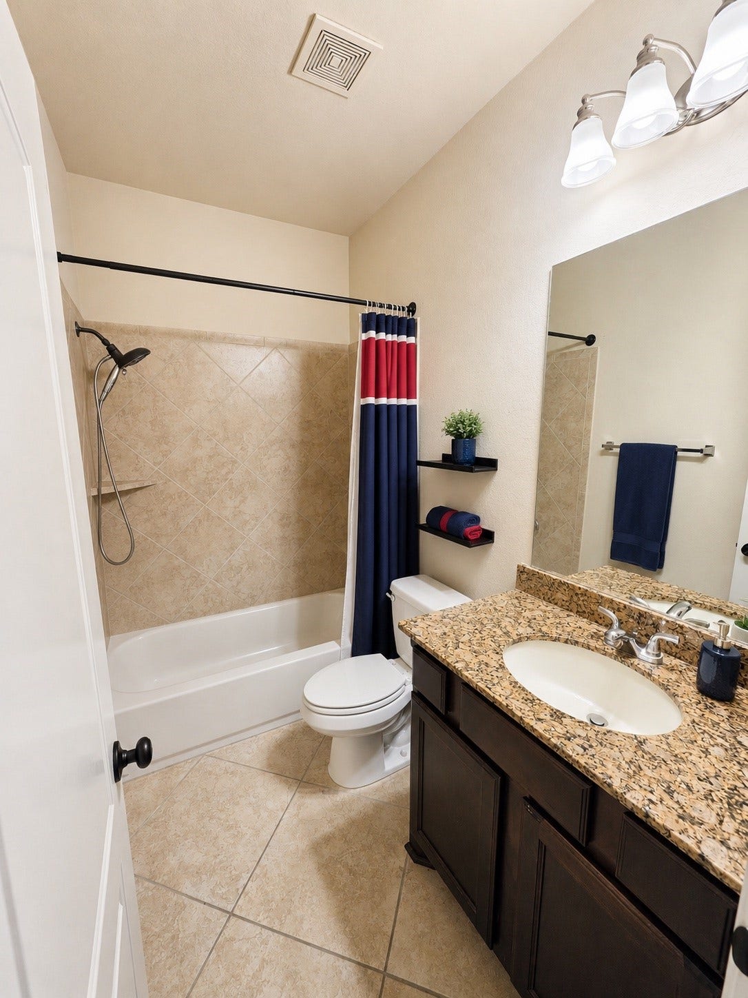 9723 Painted Stone Court, Cypress, TX 77433 Conveniently located full bathroom adjacent to Bedroom 2, perfect for easy access from the game and media rooms.