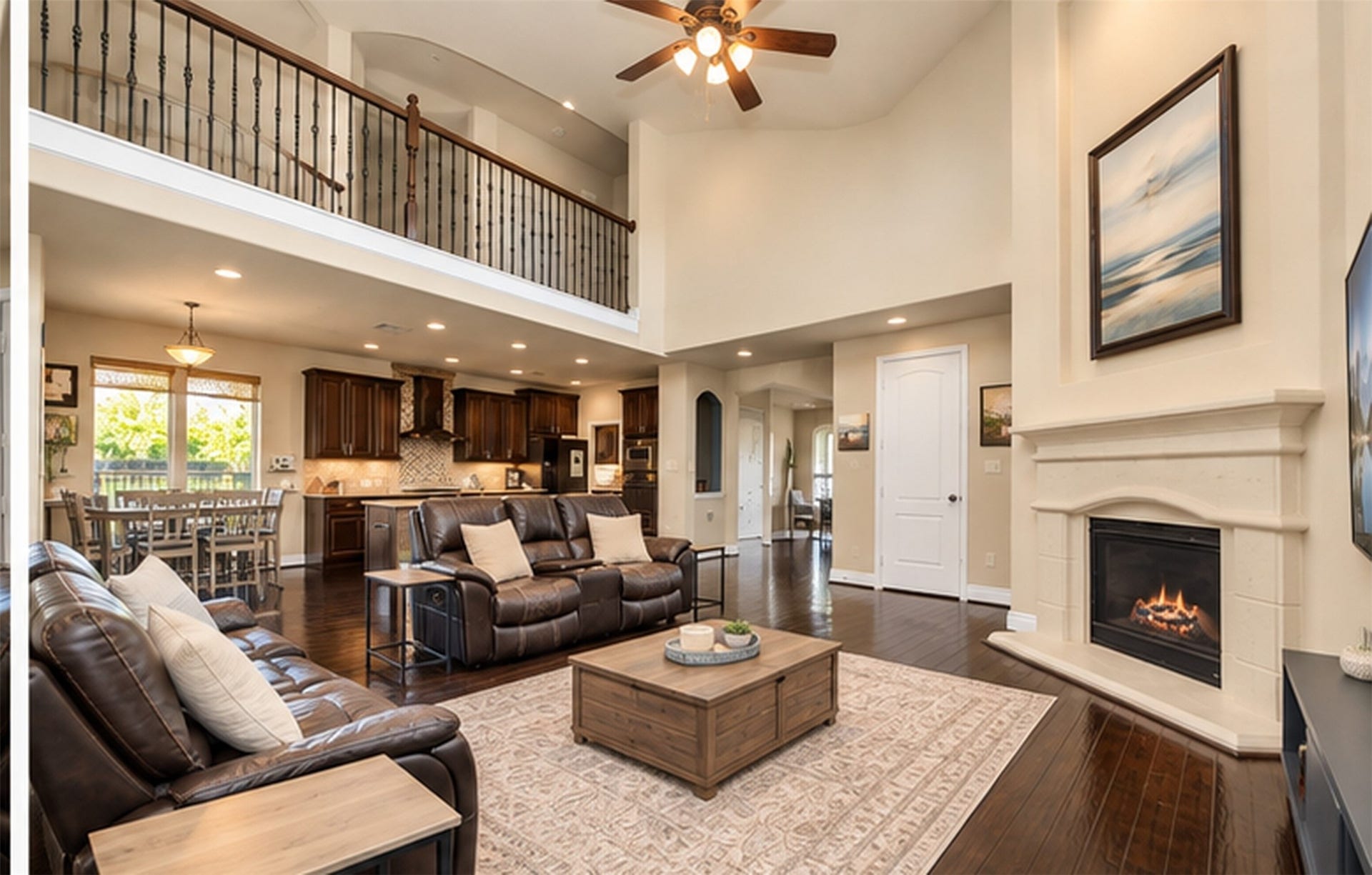 9723 Painted Stone Court, Cypress, TX 77433 The kitchen seamlessly flows into the family room, creating an inviting open-concept space.