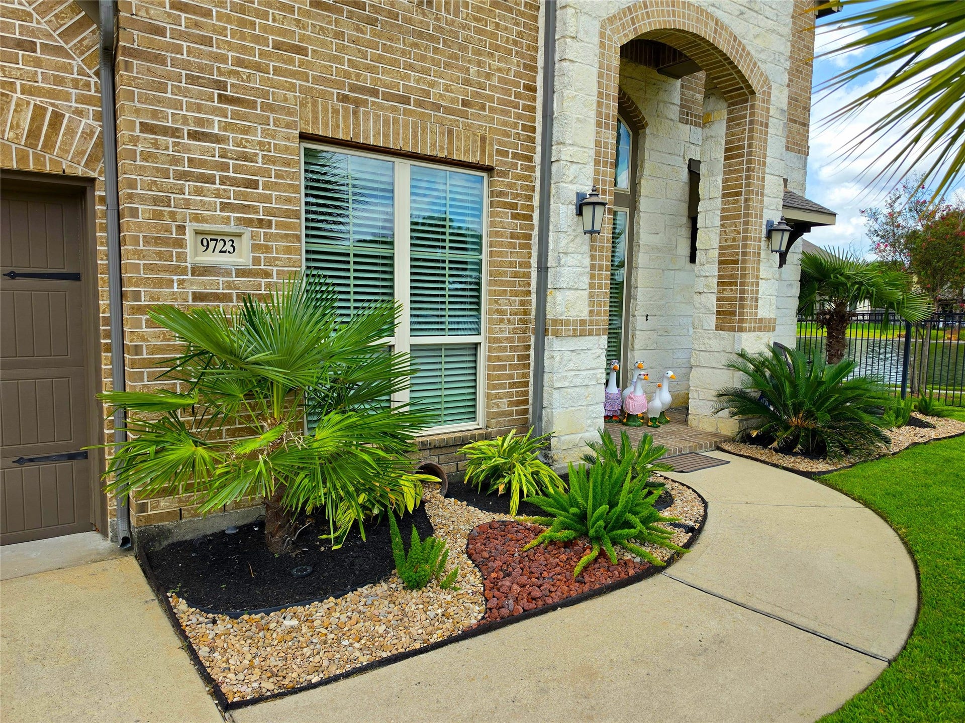 9723 Painted Stone Court, Cypress, TX 77433 Lush, mature landscaping with smart sprinklers enhances both front and back yards.