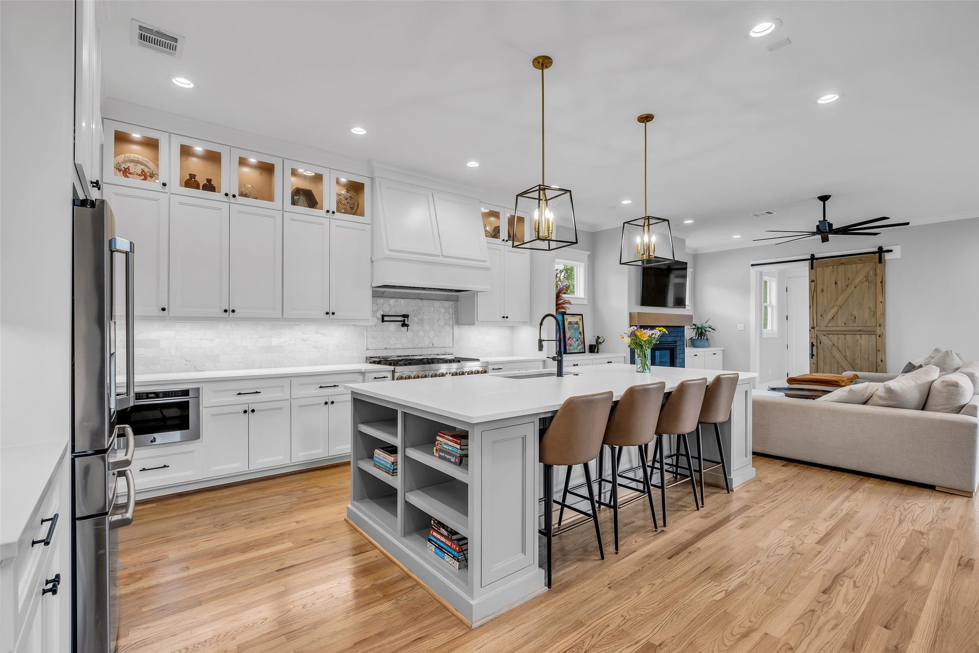 800 Walton Street, Houston, TX 77009 The kitchen island doubles as a breakfast bar, providing a casual spot for meals, snacks, or socializing while cooking.