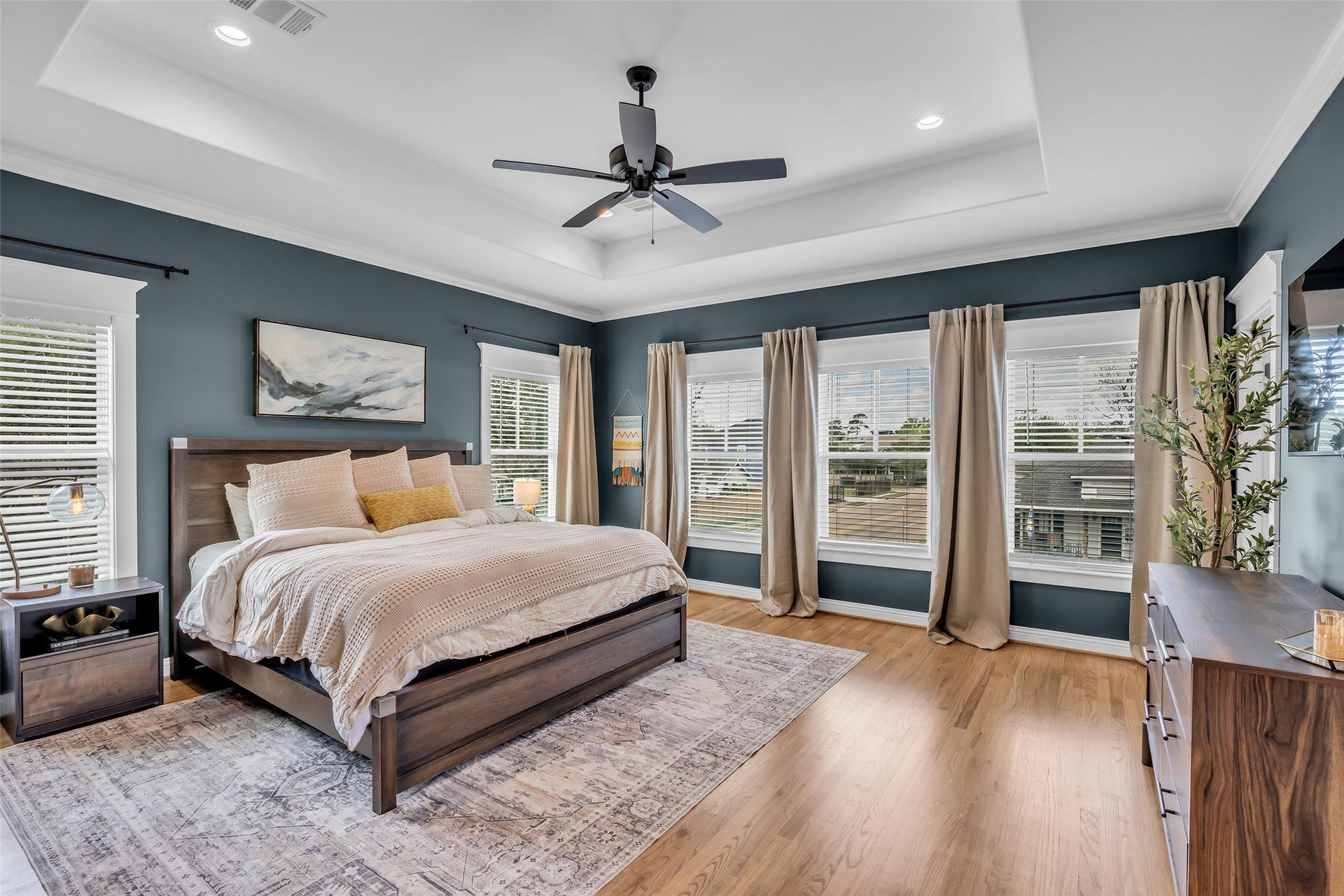800 Walton Street, Houston, TX 77009 Primary bedroom offers generous space and numerous windows that fill the room with natural light.