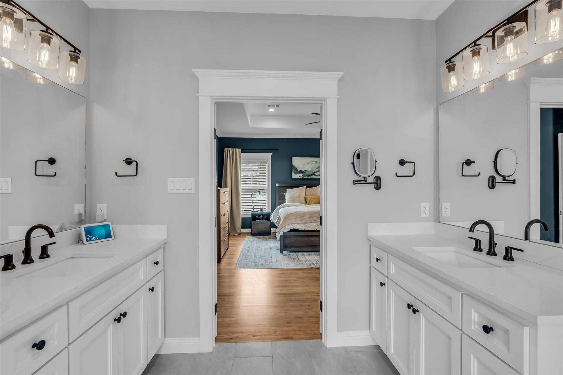 800 Walton Street, Houston, TX 77009 The primary bathroom includes two sinks and cabinets, providing plenty of storage and convenience for daily routines.