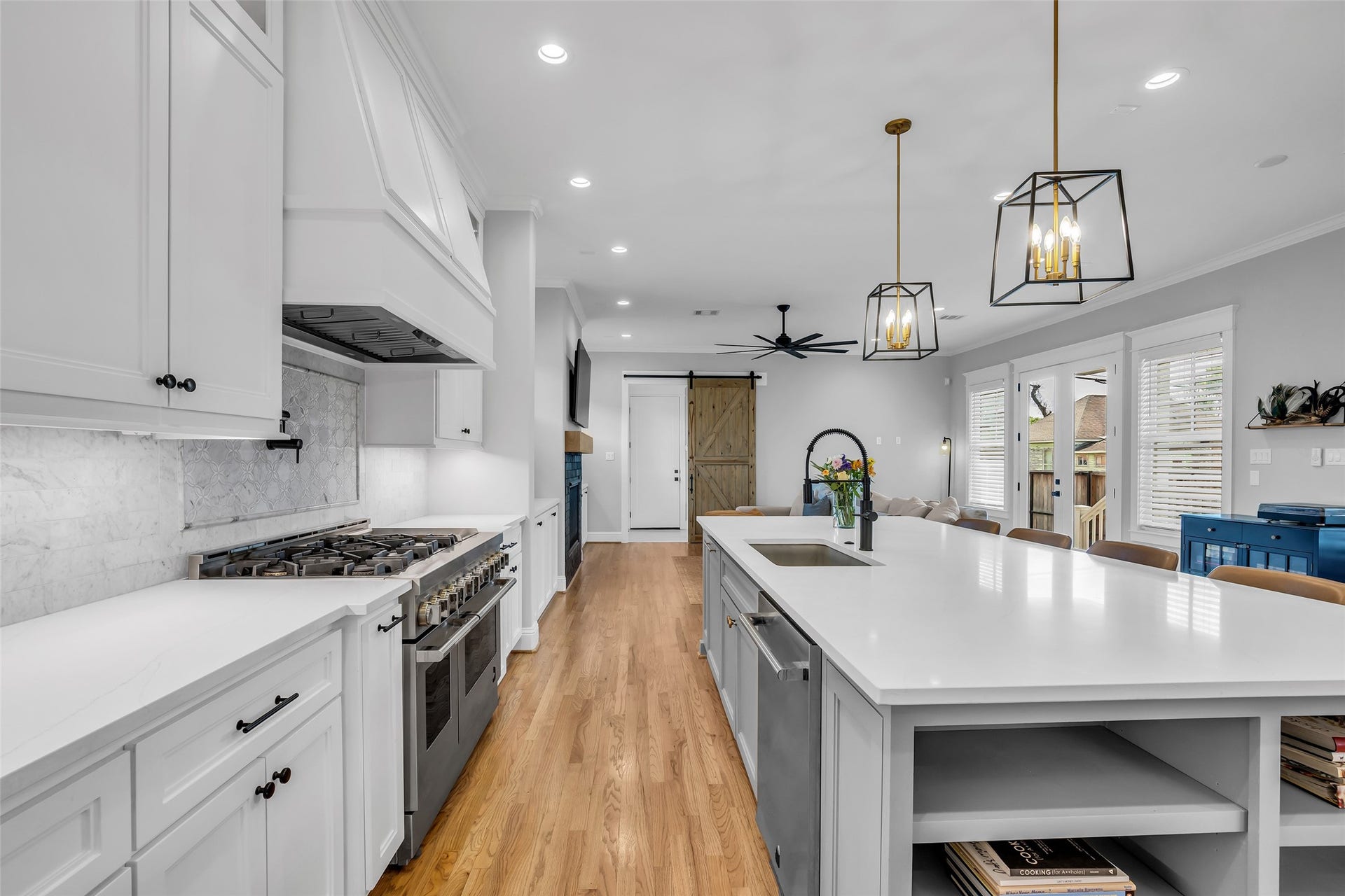 800 Walton Street, Houston, TX 77009 Another view of the kitchen shows how it opens up to the family room, creating a seamless flow between cooking and entertaining spaces.