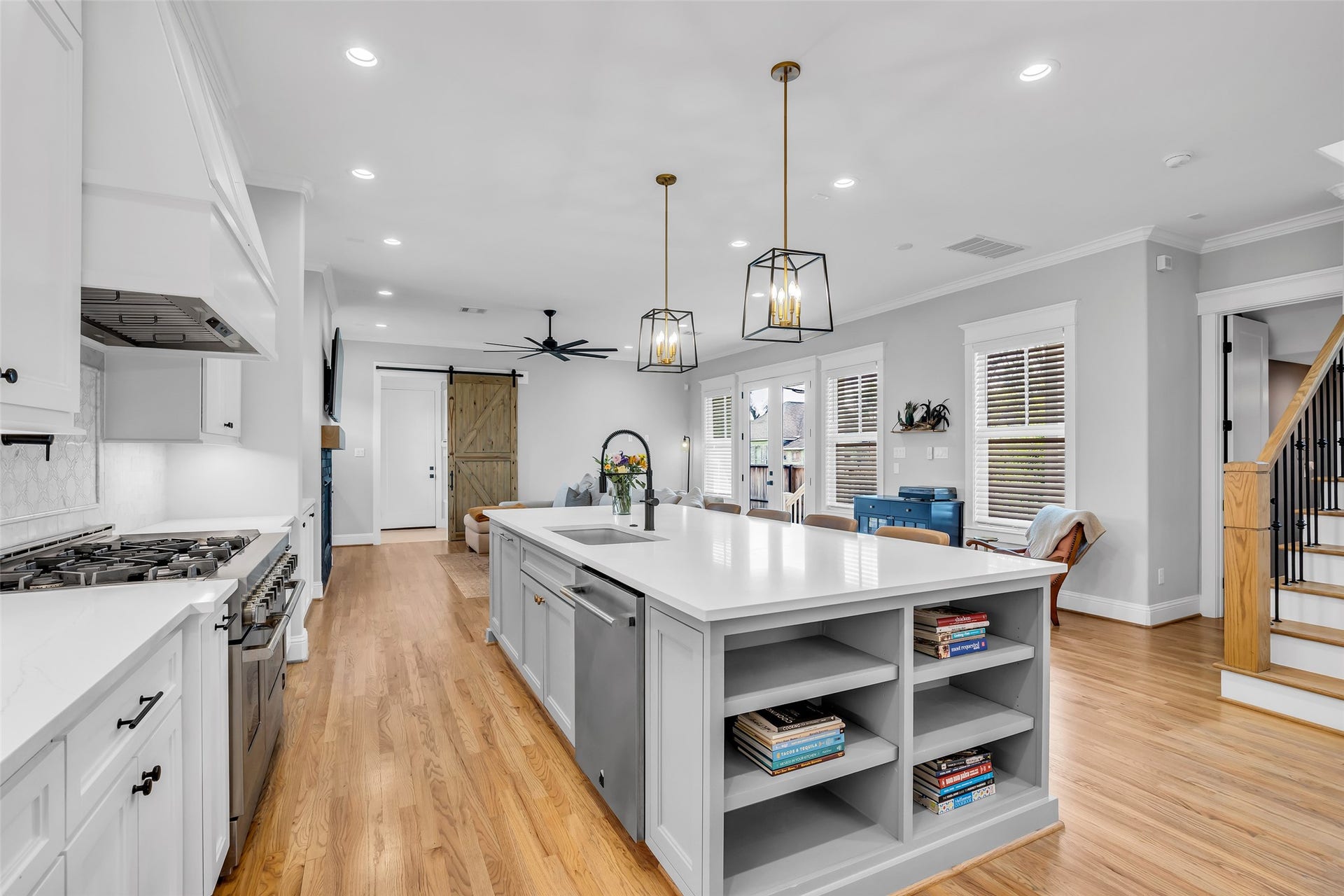 800 Walton Street, Houston, TX 77009 Both ends of the kitchen island include additional storage, offering extra space for cookware, utensils, and other kitchen essentials.