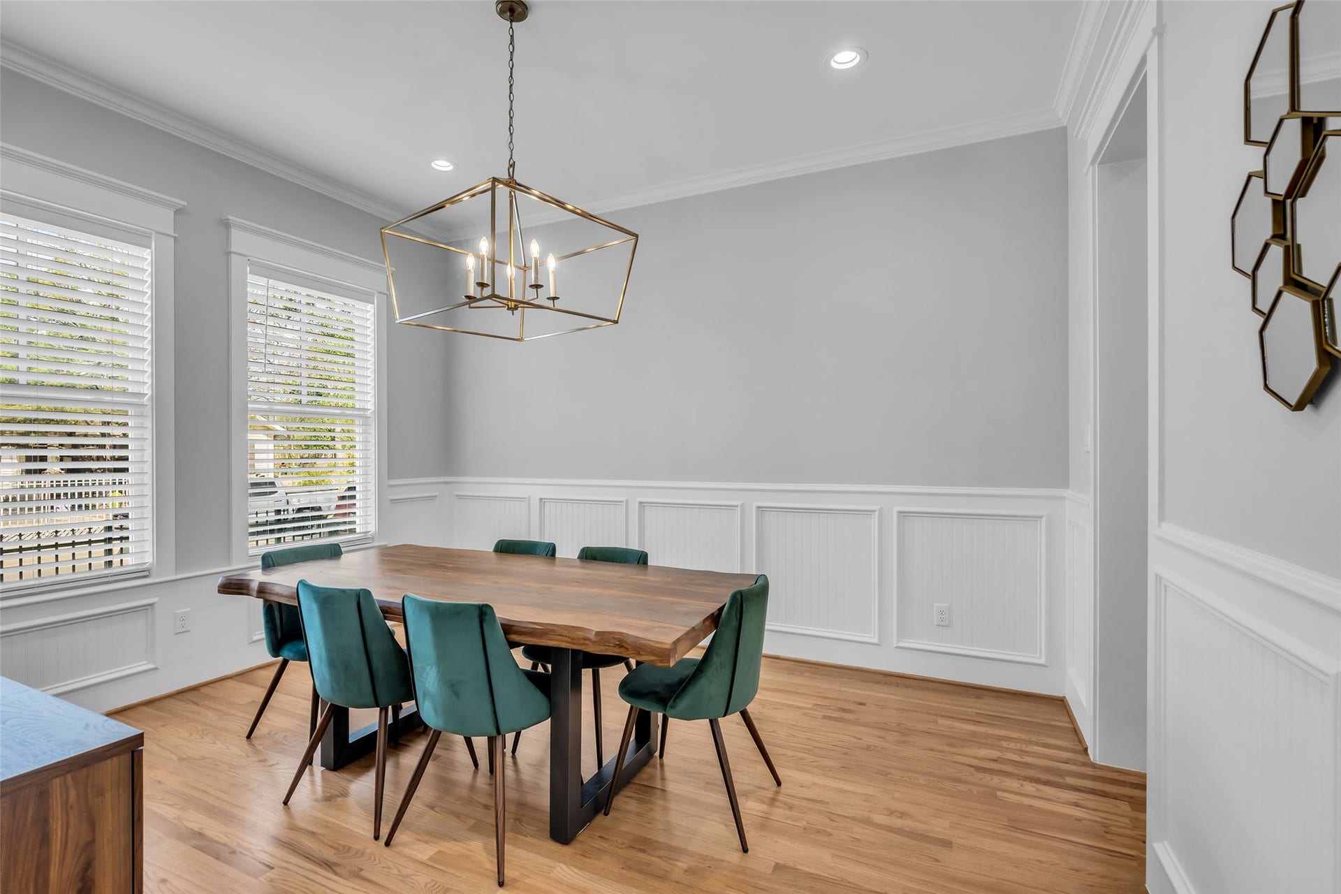 800 Walton Street, Houston, TX 77009 It features wood flooring and windows facing the front of the home, bringing in natural light and providing a clear view of the front surroundings.