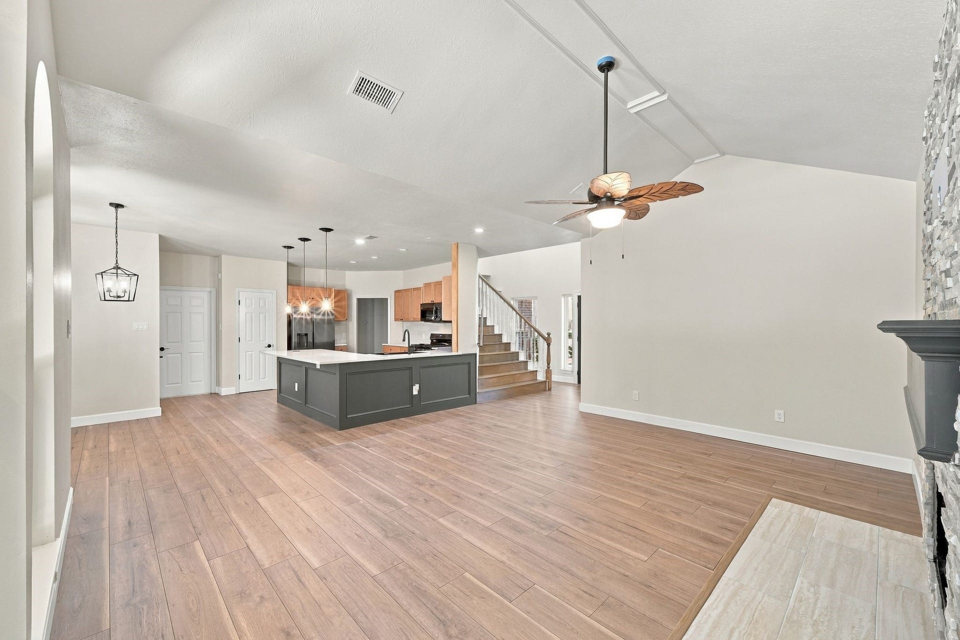 1065 Heritage Lane, Conroe, TX 77304 This is a great look from across the open living room straight into the updated kitchen and breakfast room!