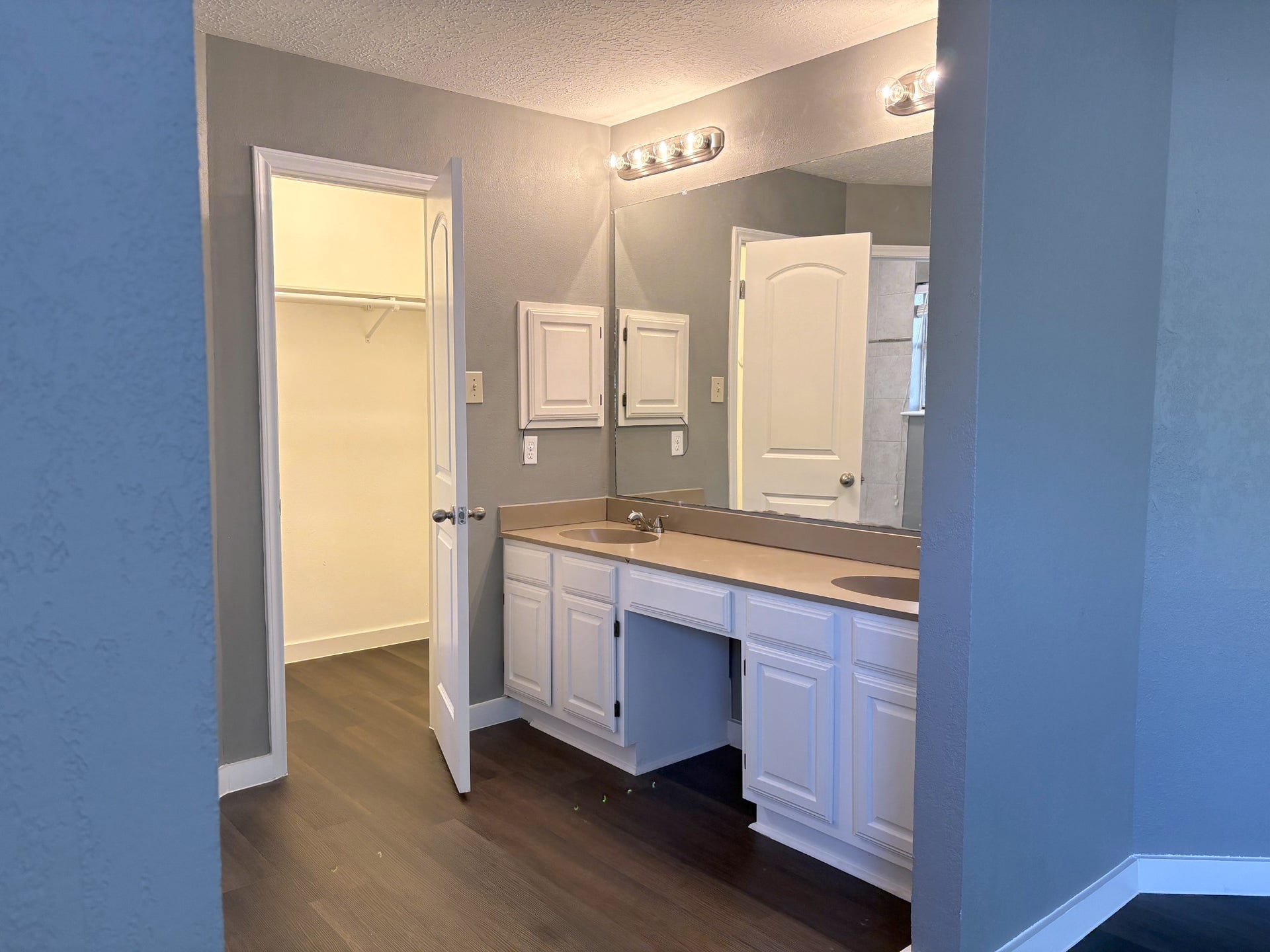 1015 Sugarfield Court, Sugar Land, TX 77498 A spacious vanity with dual sinks makes getting ready a breeze
