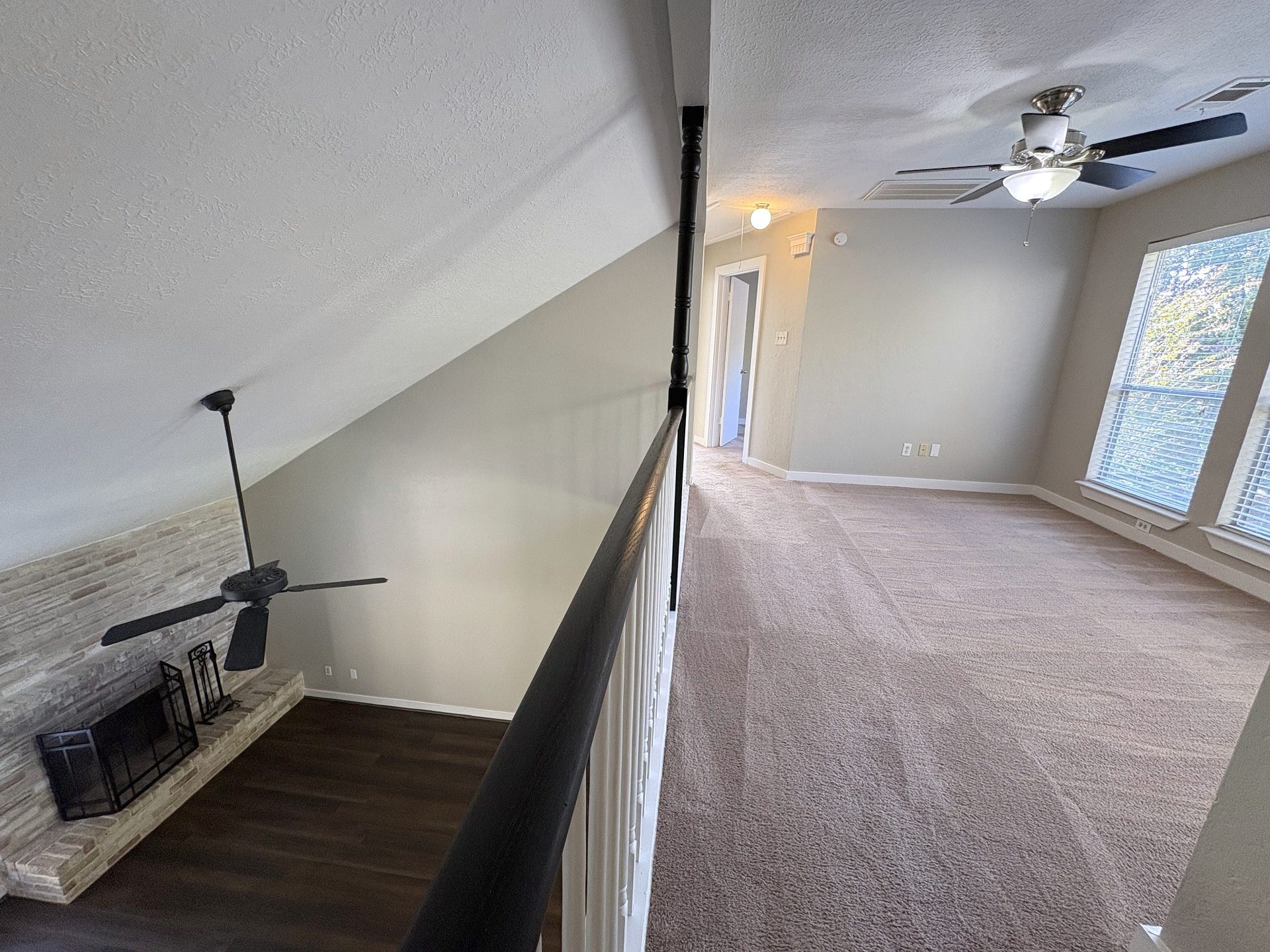 1015 Sugarfield Court, Sugar Land, TX 77498 An open loft overlooks the living area below