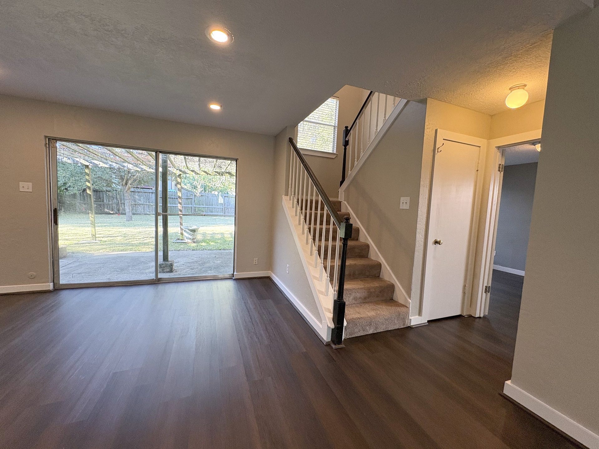 1015 Sugarfield Court, Sugar Land, TX 77498 Oversized patio doors for a great view of the serene back yard
