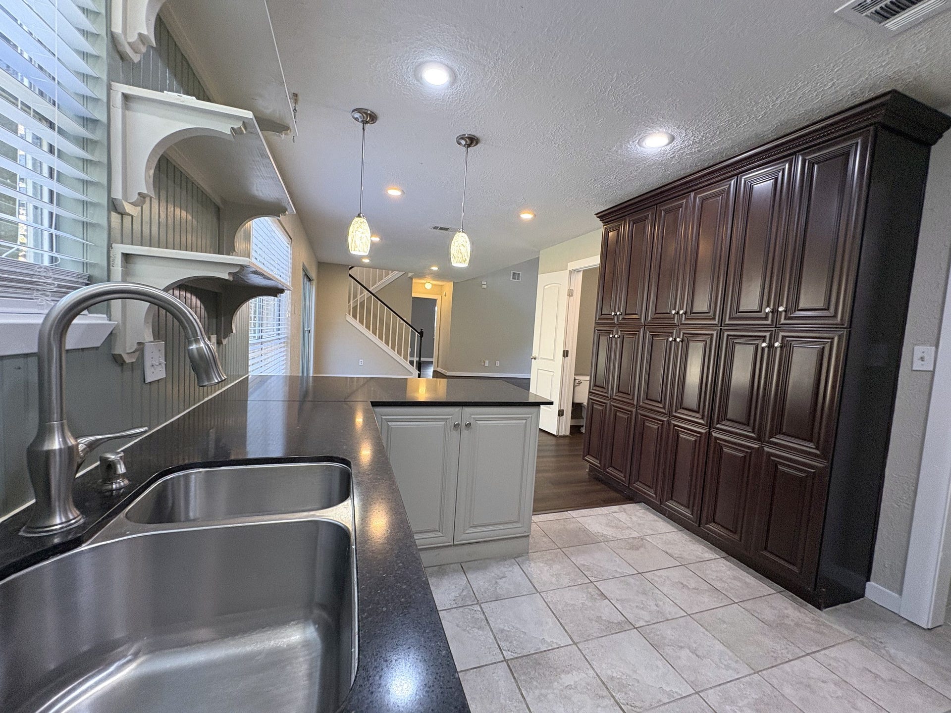 1015 Sugarfield Court, Sugar Land, TX 77498 Plenty of storage in the beautiful wood cabinets
