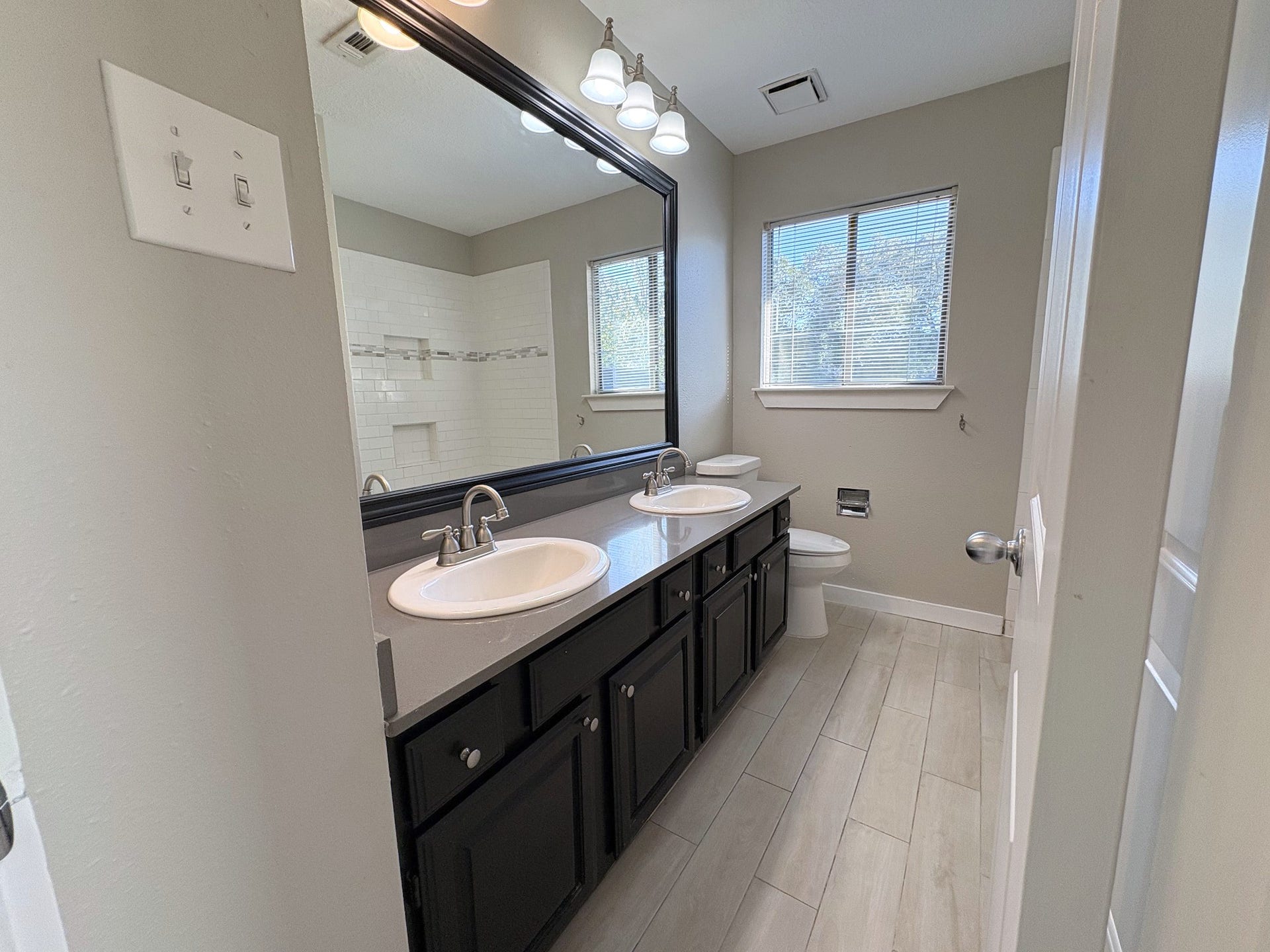 1015 Sugarfield Court, Sugar Land, TX 77498 Beautiful updated bath upstairs features custom tile and granite