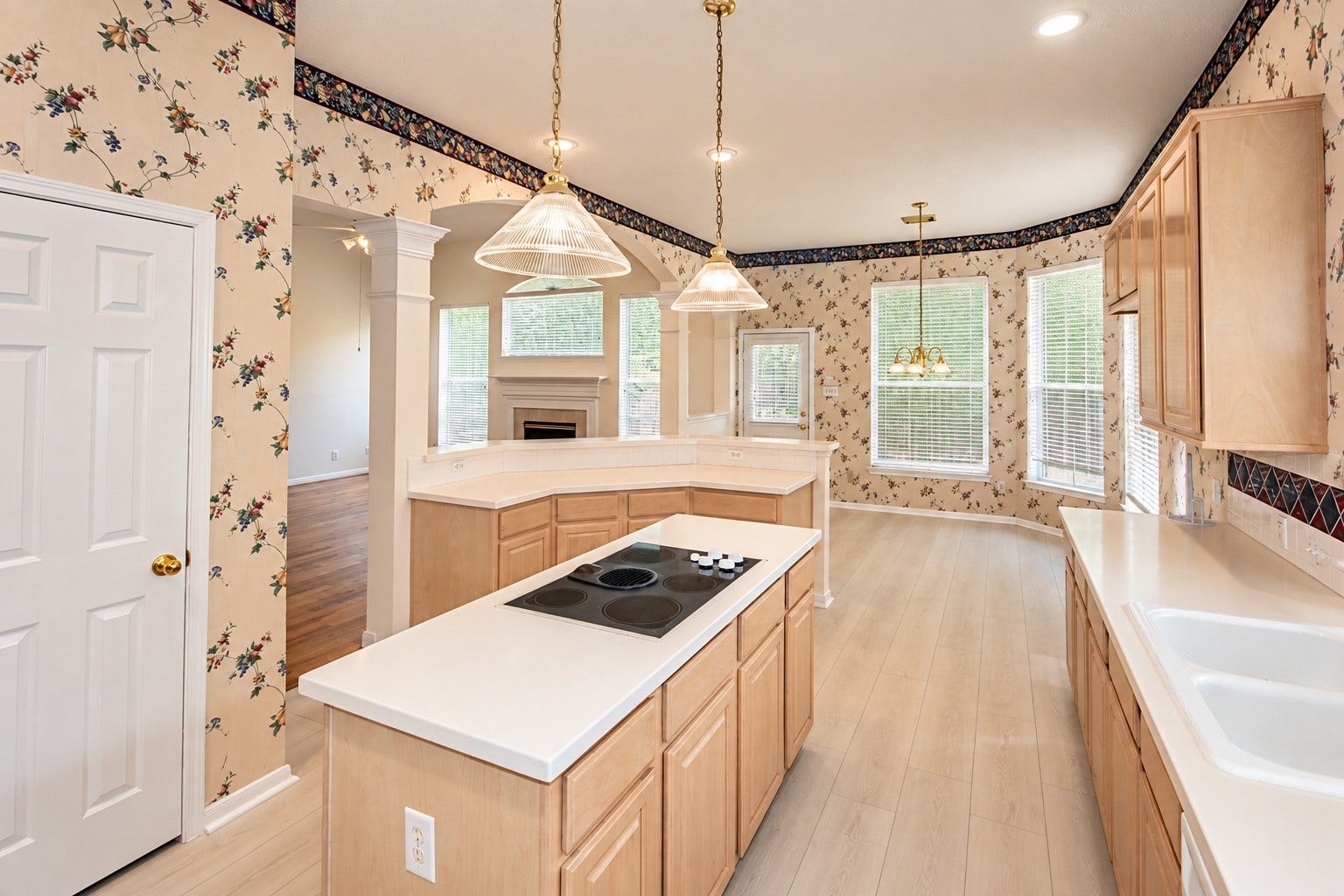Another view of the island kitchen and breakfast area