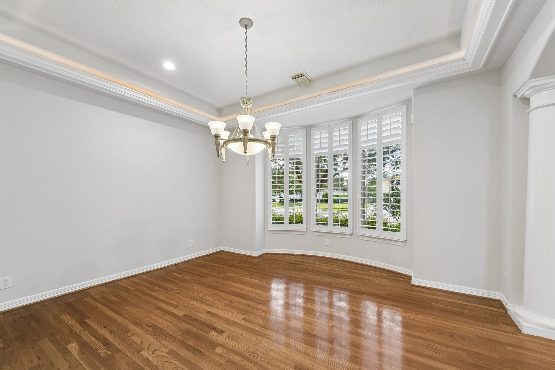 2731 Lakecrest Drive, Pearland, TX 77584 Formal dining with tray lighting all around.