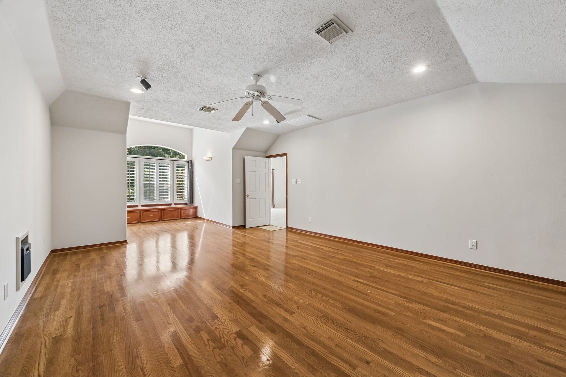 2731 Lakecrest Drive, Pearland, TX 77584 Media room has hardwood floors and a separate space. Access is from the upstairs gameroom.