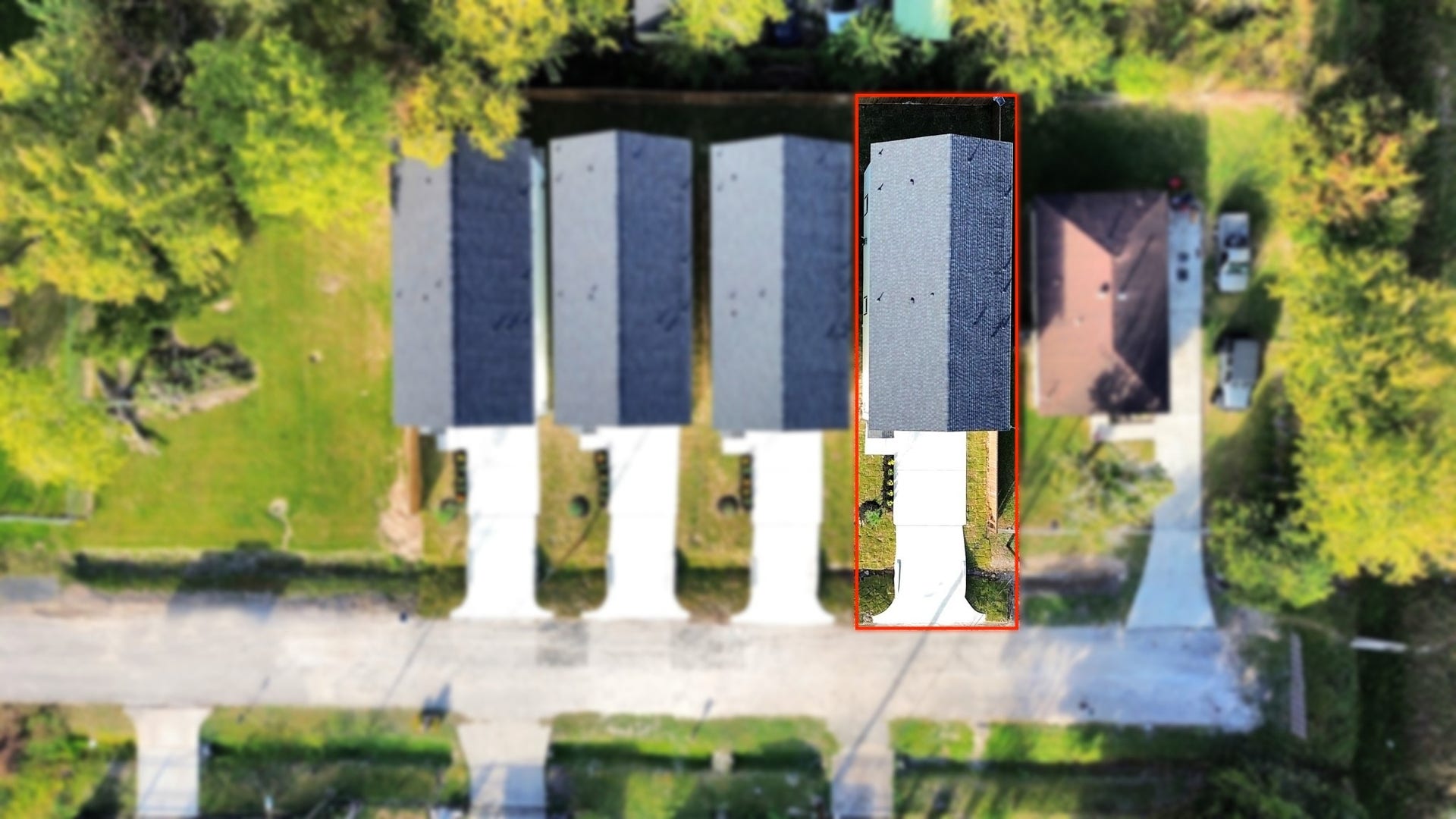 6677 Nielan Street, Houston, TX 77028 Overhead aerial view showcasing the four newly completed homes at 6671, 6673, 6675 & 6677 Nielan St, highlighting their matching architectural designs, individual driveways & property layouts.