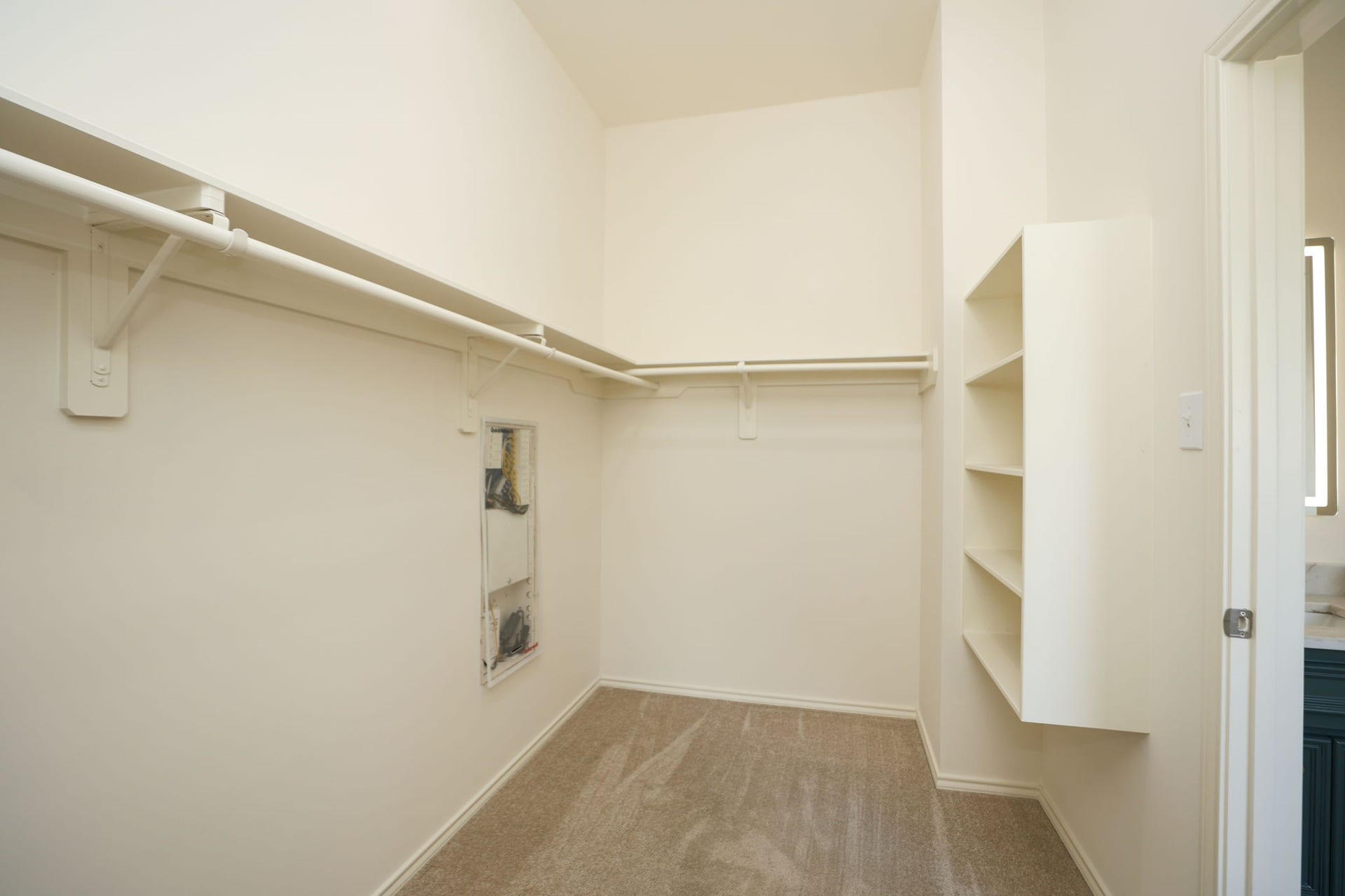 4814 Mosaic Canyon Court, Humble, TX 77396 Generous walk-in closet with more storage behind the photographer.