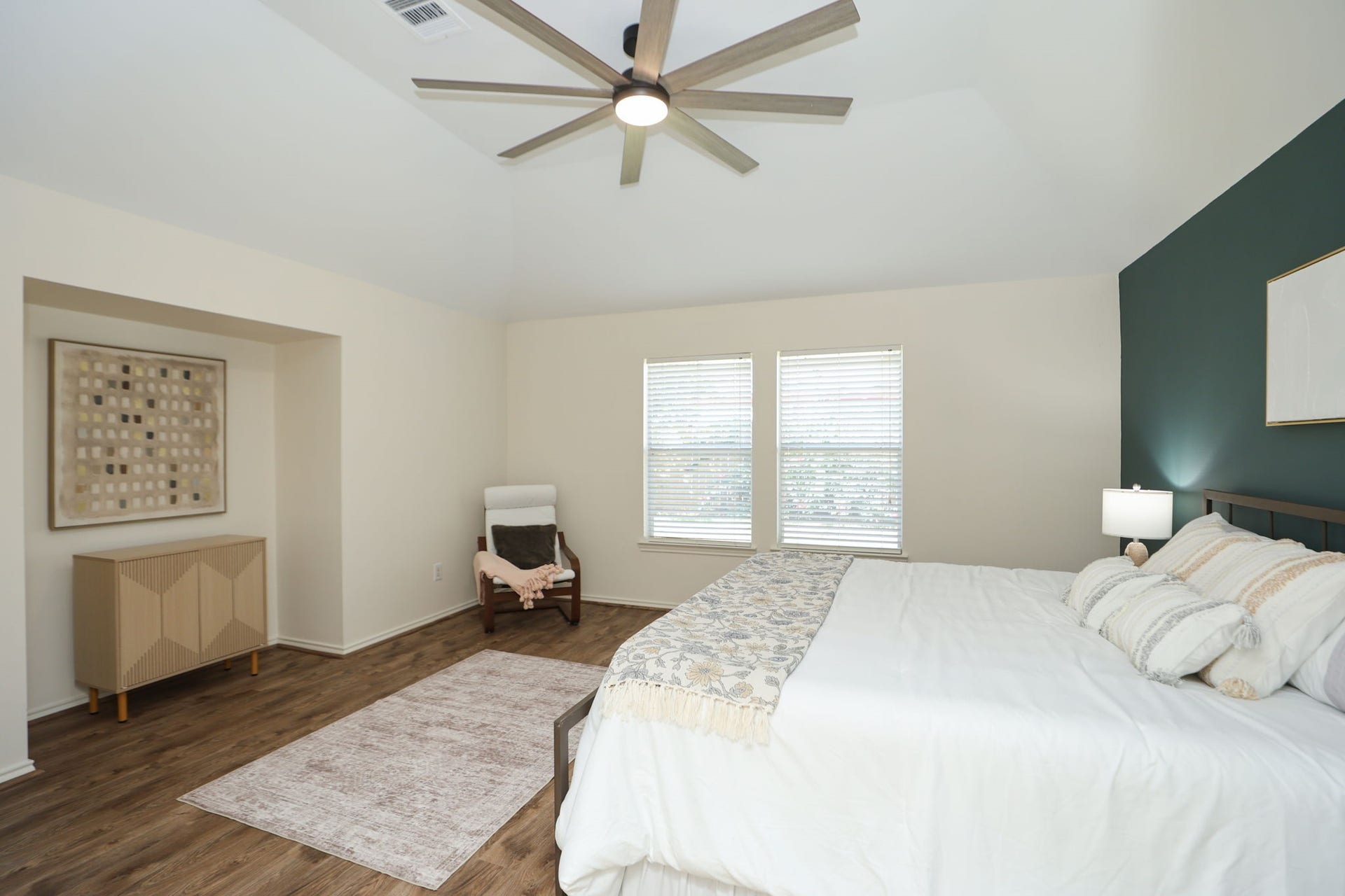 4814 Mosaic Canyon Court, Humble, TX 77396 Another view of the primary bedroom showing the inset wall for bedtime TV watching or a dresser. Large enough to accommodate a king size bed (present now) and seating.