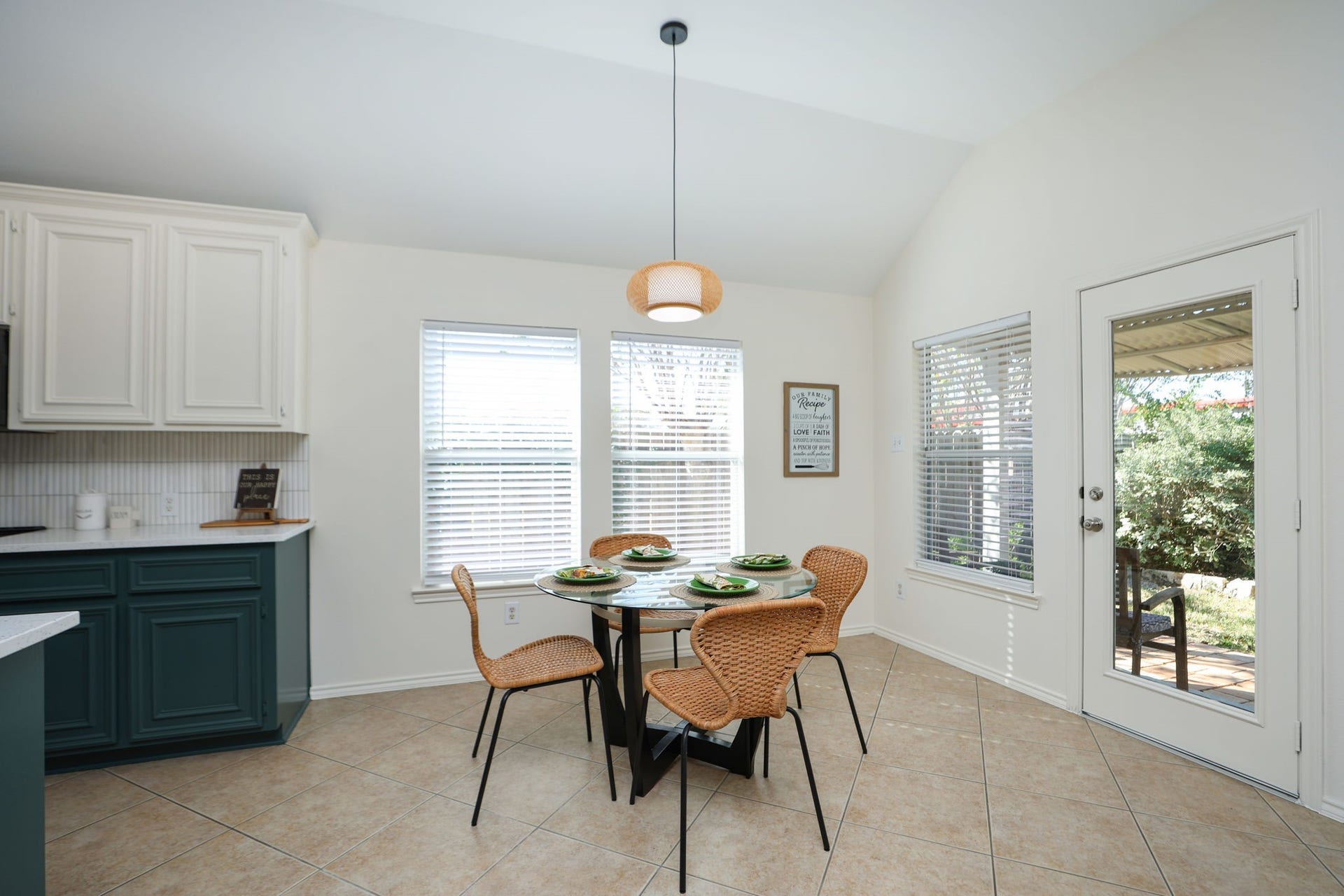4814 Mosaic Canyon Court, Humble, TX 77396 Large eat-in kitchen with windows to the lush backyard. Back door and porch to the right of this photo.