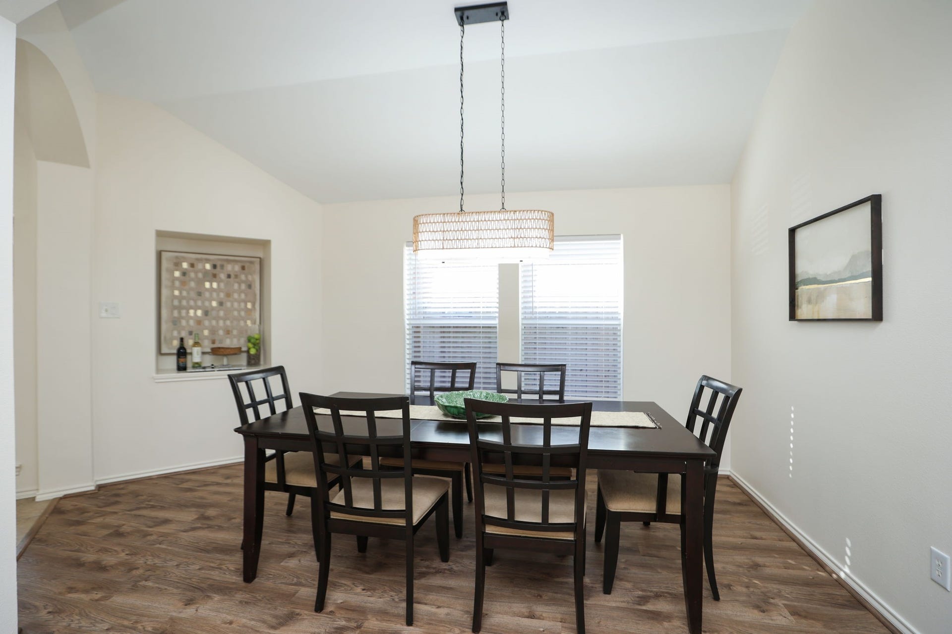 4814 Mosaic Canyon Court, Humble, TX 77396 Spacious dining room with modern light fixture and new LVP flooring. Could also be a playroom, 2nd living space, or place for your pool table!