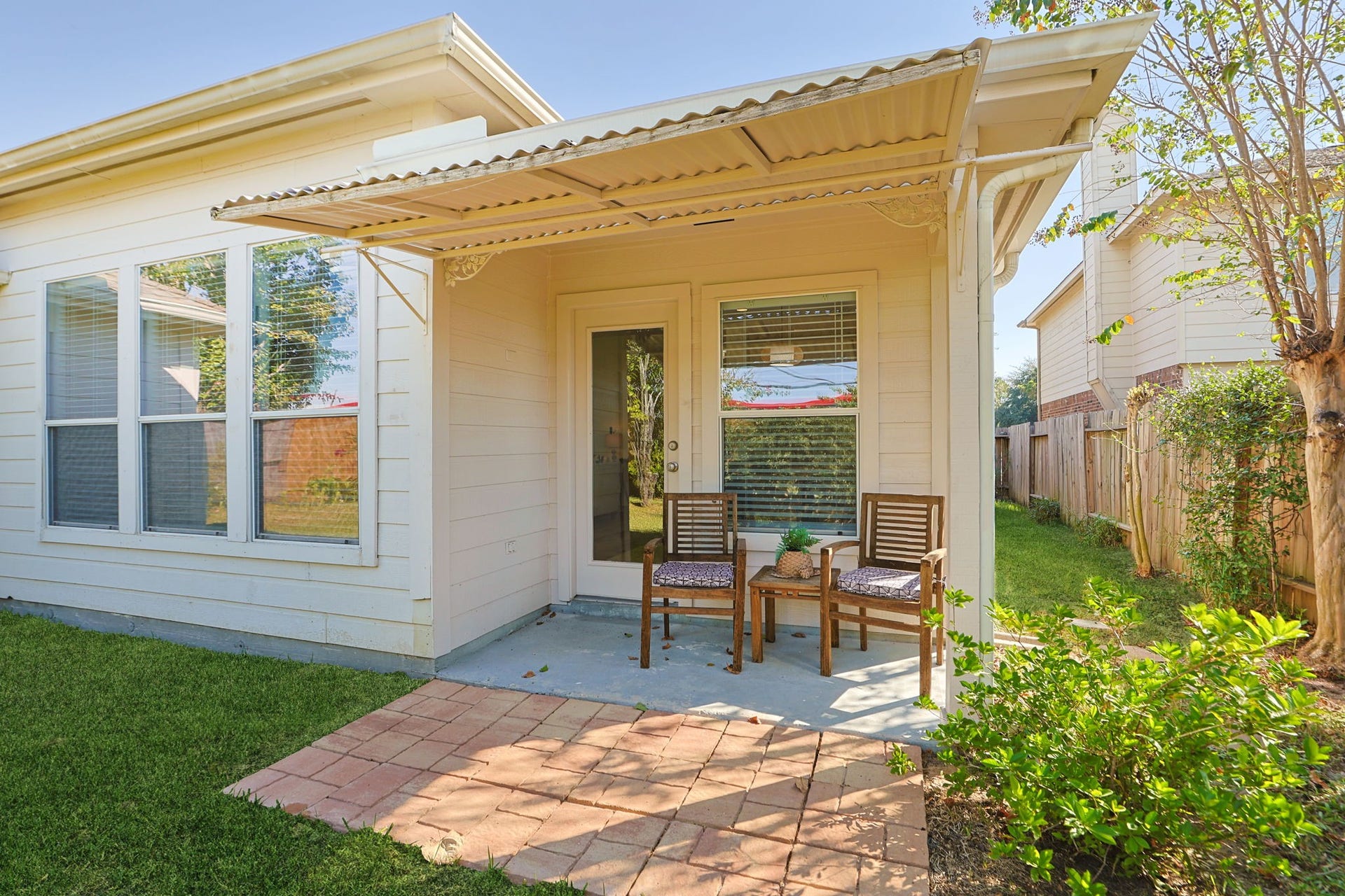 4814 Mosaic Canyon Court, Humble, TX 77396 Extended back porch for your morning coffee or watching playtime in the backyard.