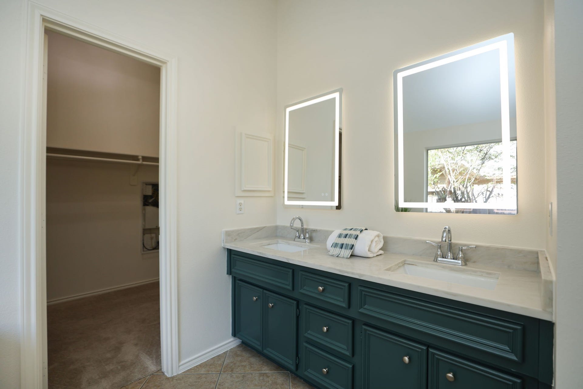 4814 Mosaic Canyon Court, Humble, TX 77396 Primary bath features a light countertop and optional lit vanity mirrors. Whole home has been redone for its new owner!