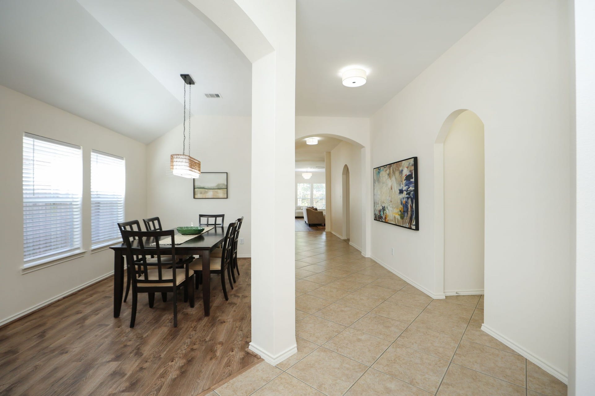 4814 Mosaic Canyon Court, Humble, TX 77396 View from the front door showcasing the 6 foot wide central hallway, high ceilings, and modern feel.