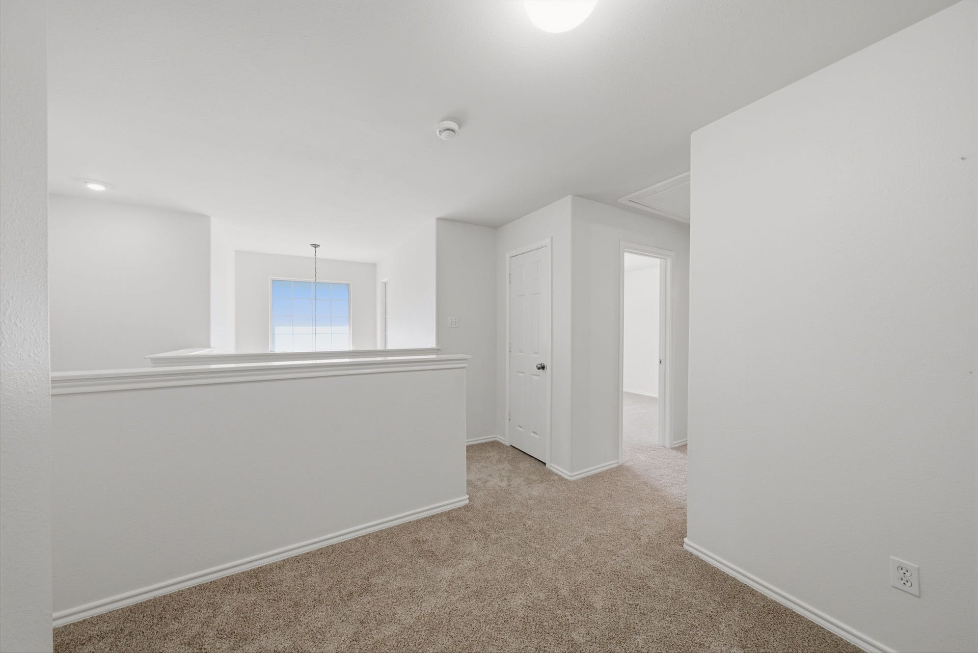 30 Blue Creek Place, The Woodlands, TX 77382 Loft located between the bedrooms at the top of the stairs.