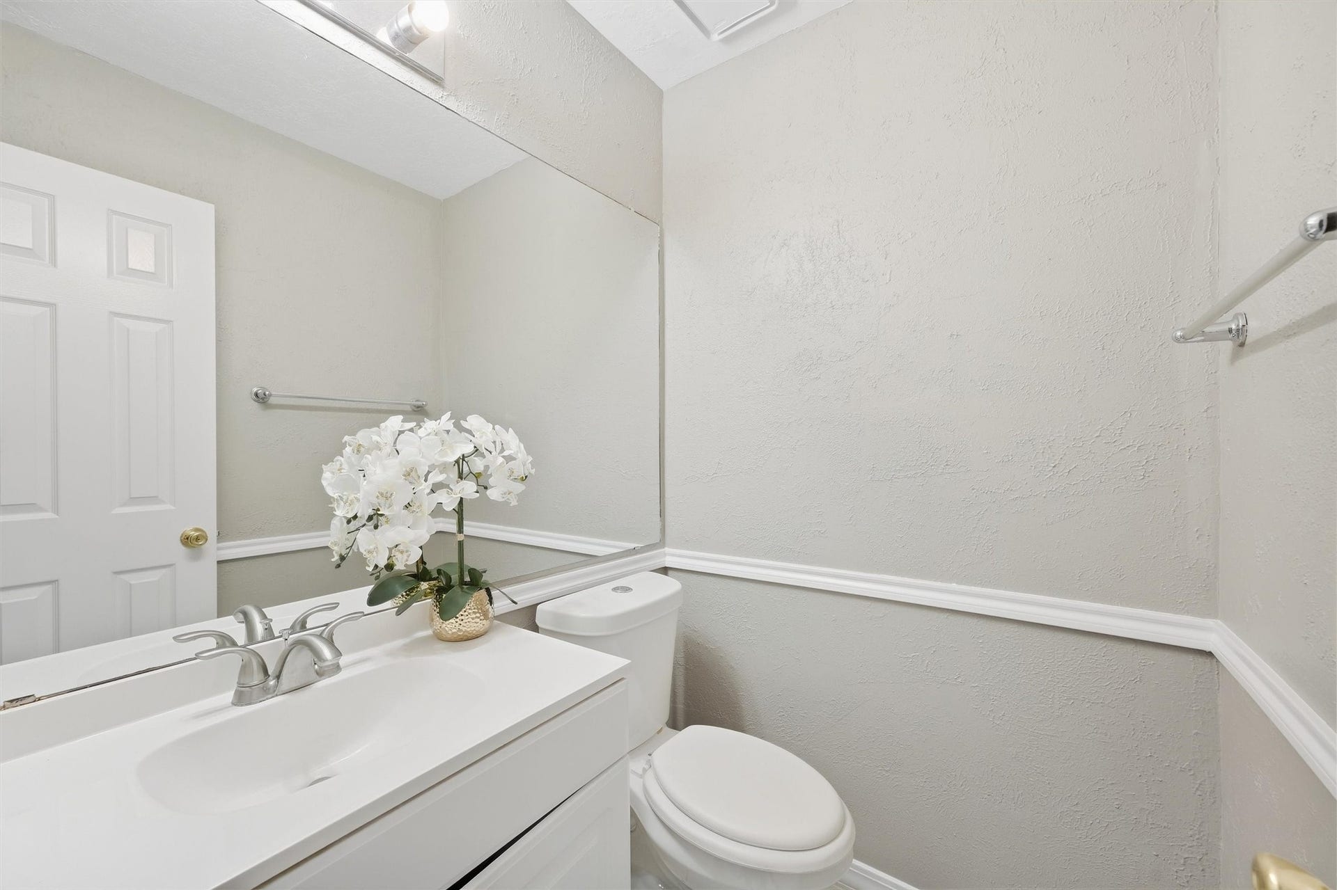 1926 Victoria Garden Drive, Richmond, TX 77406 Convenient downstairs half bathperfect for guests and everyday use.