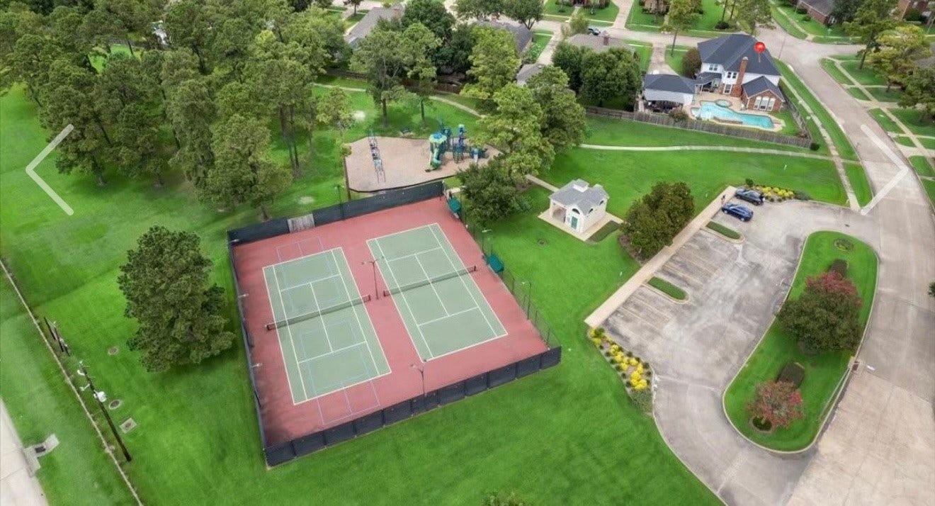 Aerial view of community Park and tennis courts right behind the home which you can easily access through the backyard gate
