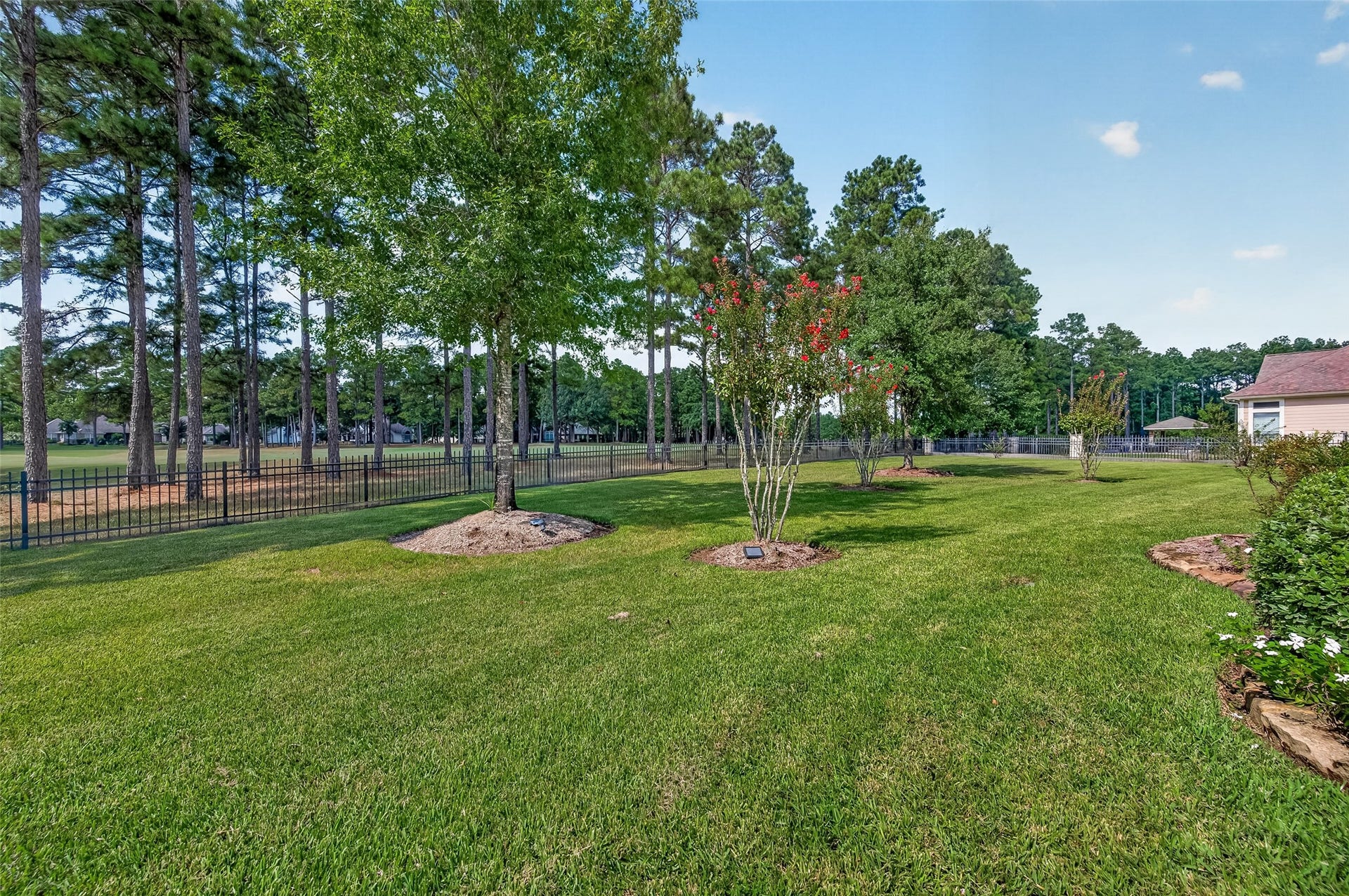 28723 Post Oak Run, Magnolia, TX 77355 Private gate entry onto the golf course.
