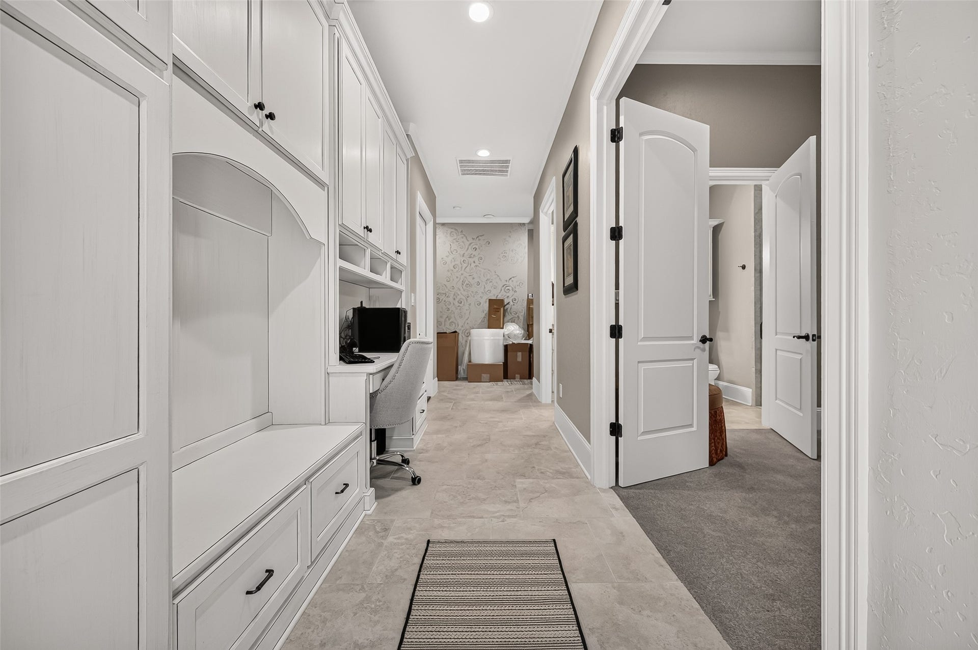 28723 Post Oak Run, Magnolia, TX 77355 Hallway leading to media room and garage.