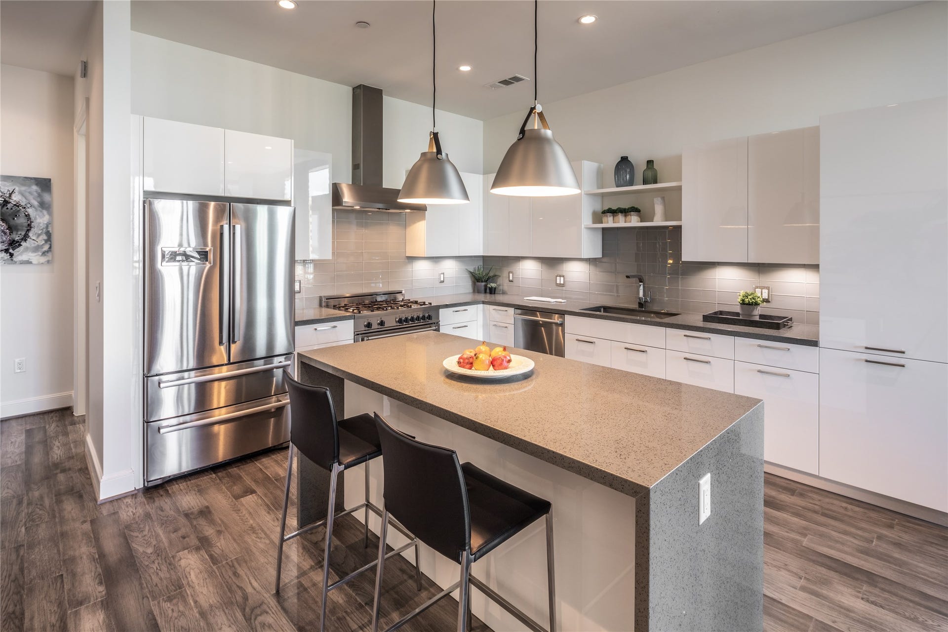 [Kitchen VIRTUALLY STAGED] Featuring bespoke lighting, elegant lacquered Pedini custom cabinets and drawers, top of line stainless steel appliances
