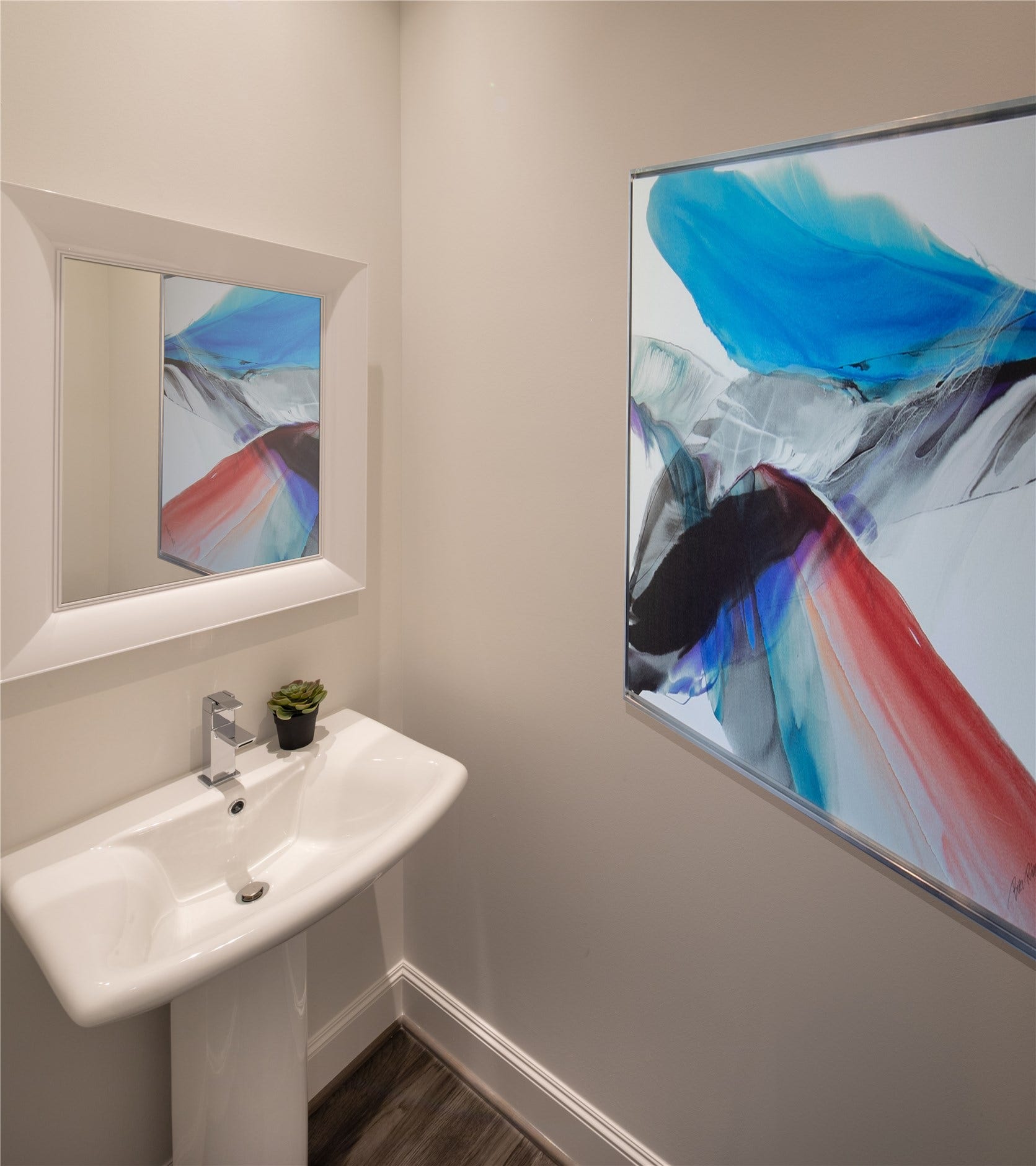 [Powder Room] Conveniently and privately located in foyer, with pedestal sink