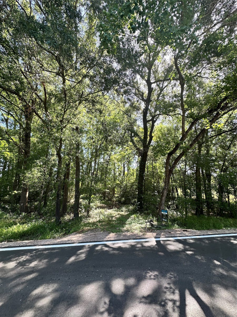 Property photo for 64 River Plantation Drive, Conroe, TX