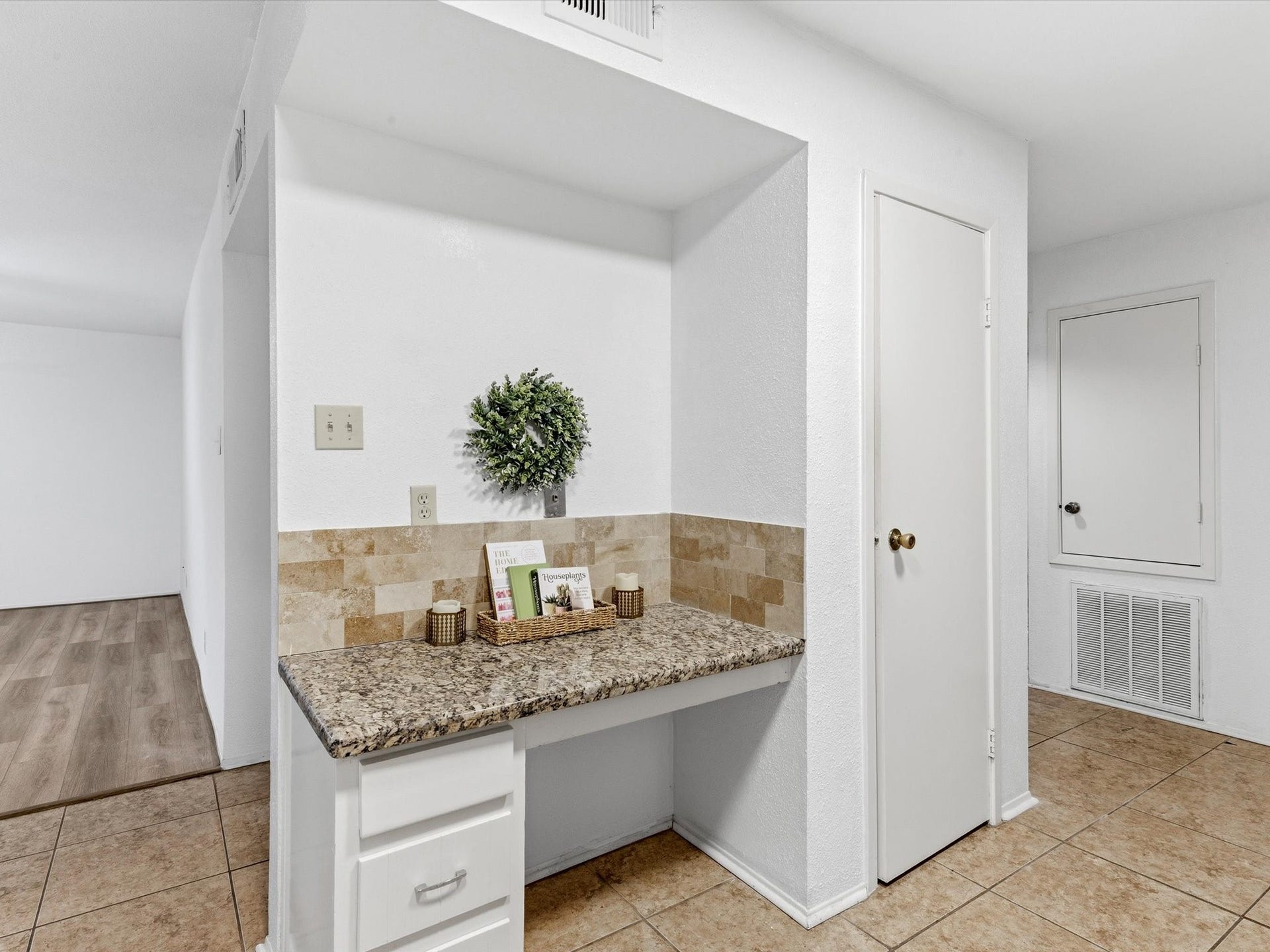 Convenient built-in desk area, perfect for a small workspace or organizing everyday essentials.