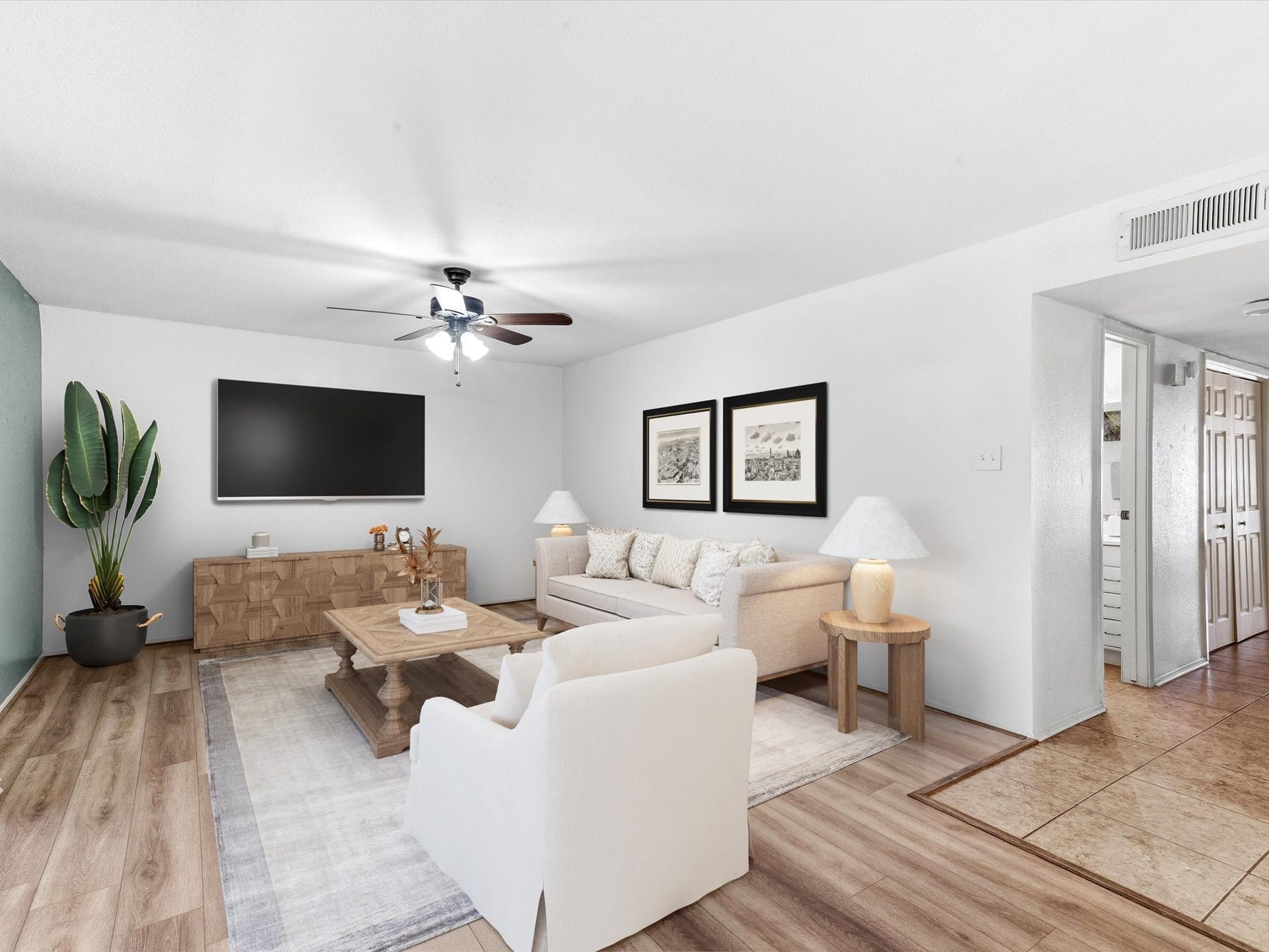 Another virtually staged view showing how the spacious living area can be arranged for everyday living.